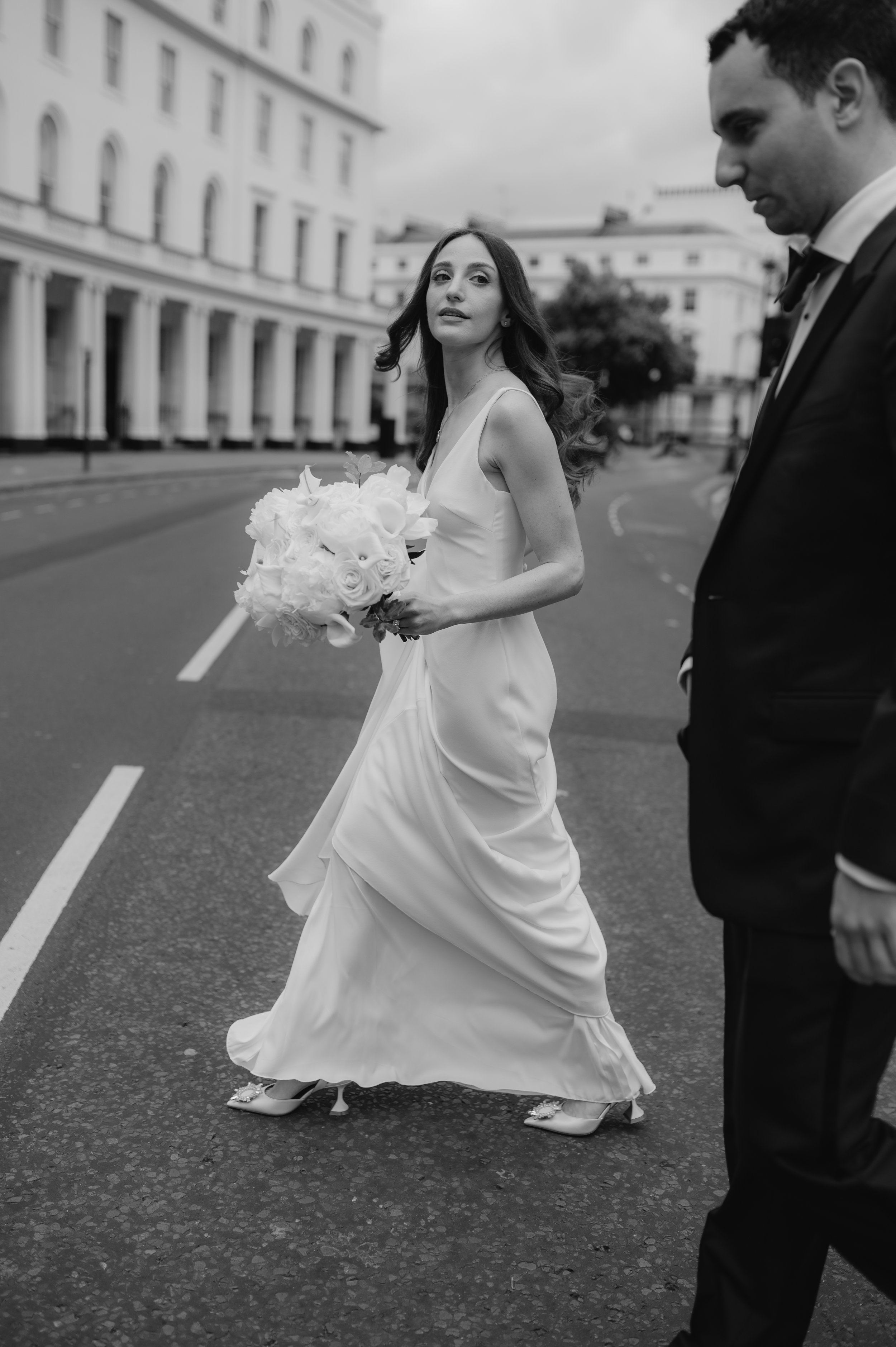 London wedding photography at Marylebone Town Hall bride crossing road