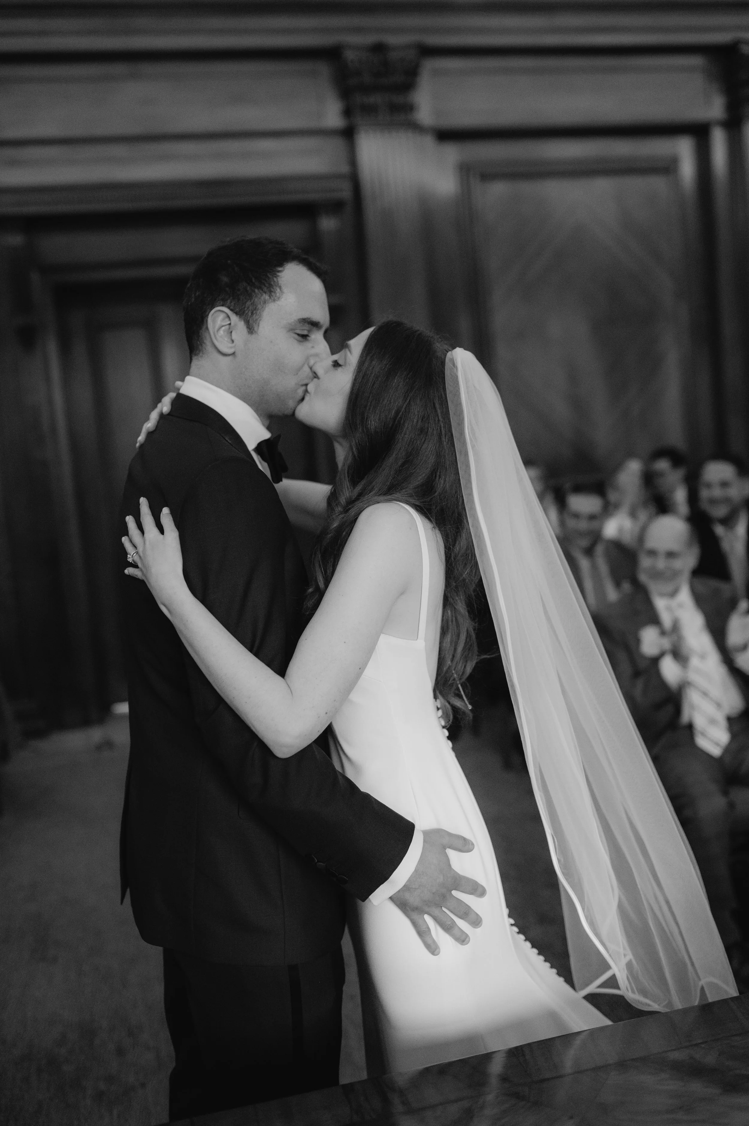 London wedding photography at Marylebone Town Hall bride and groom kissing