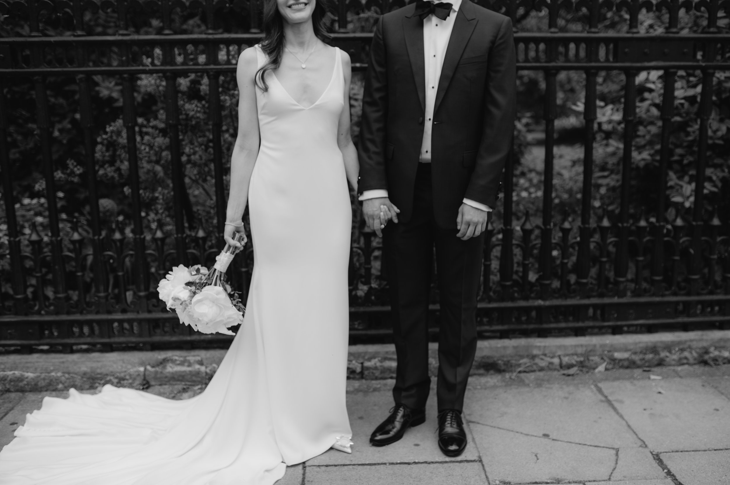 London wedding photography at Marylebone Town Hall bride and groom holding hands