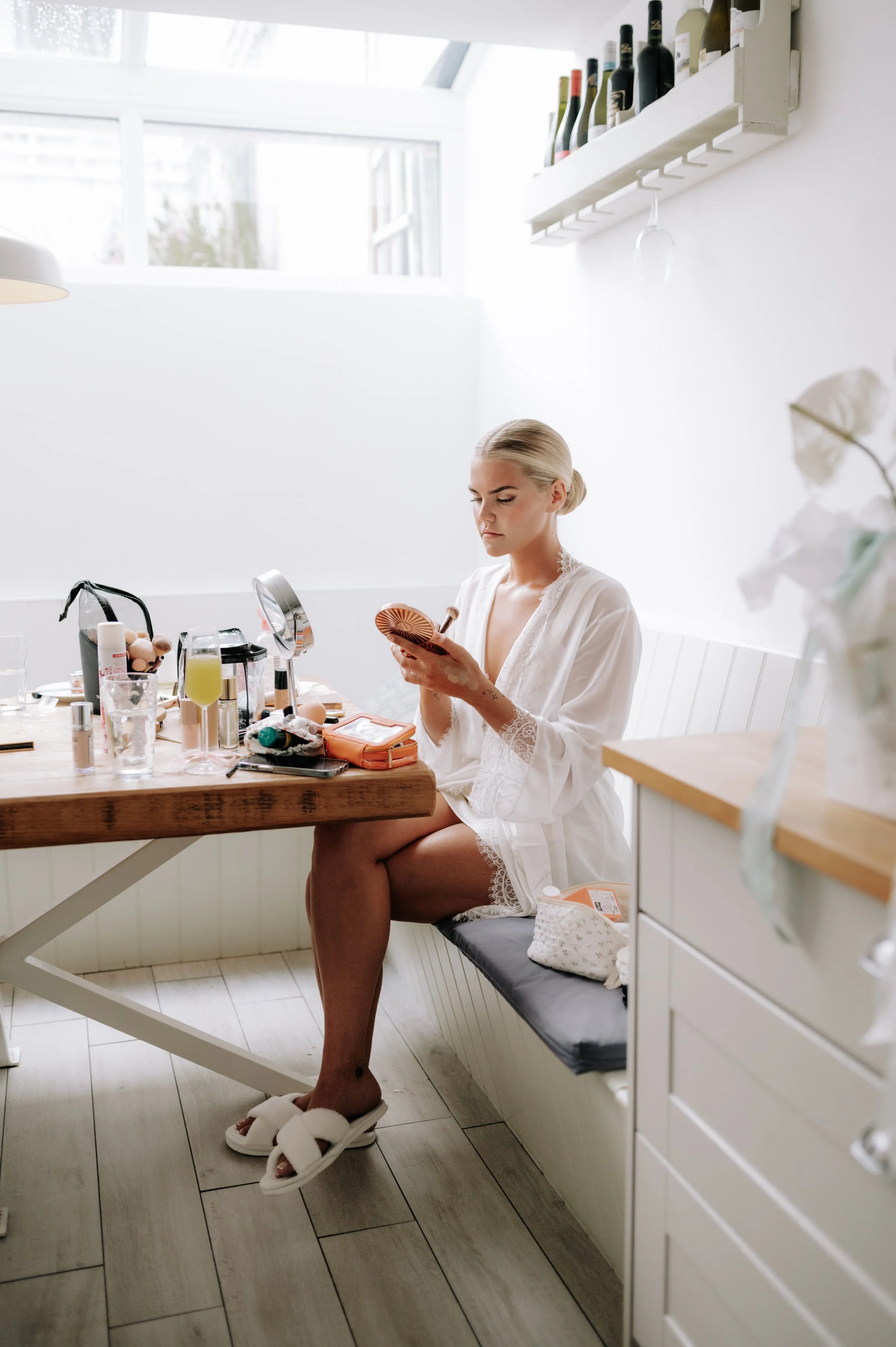 Bride getting ready at Brighton wedding. Fine art documentary wedding photography. 