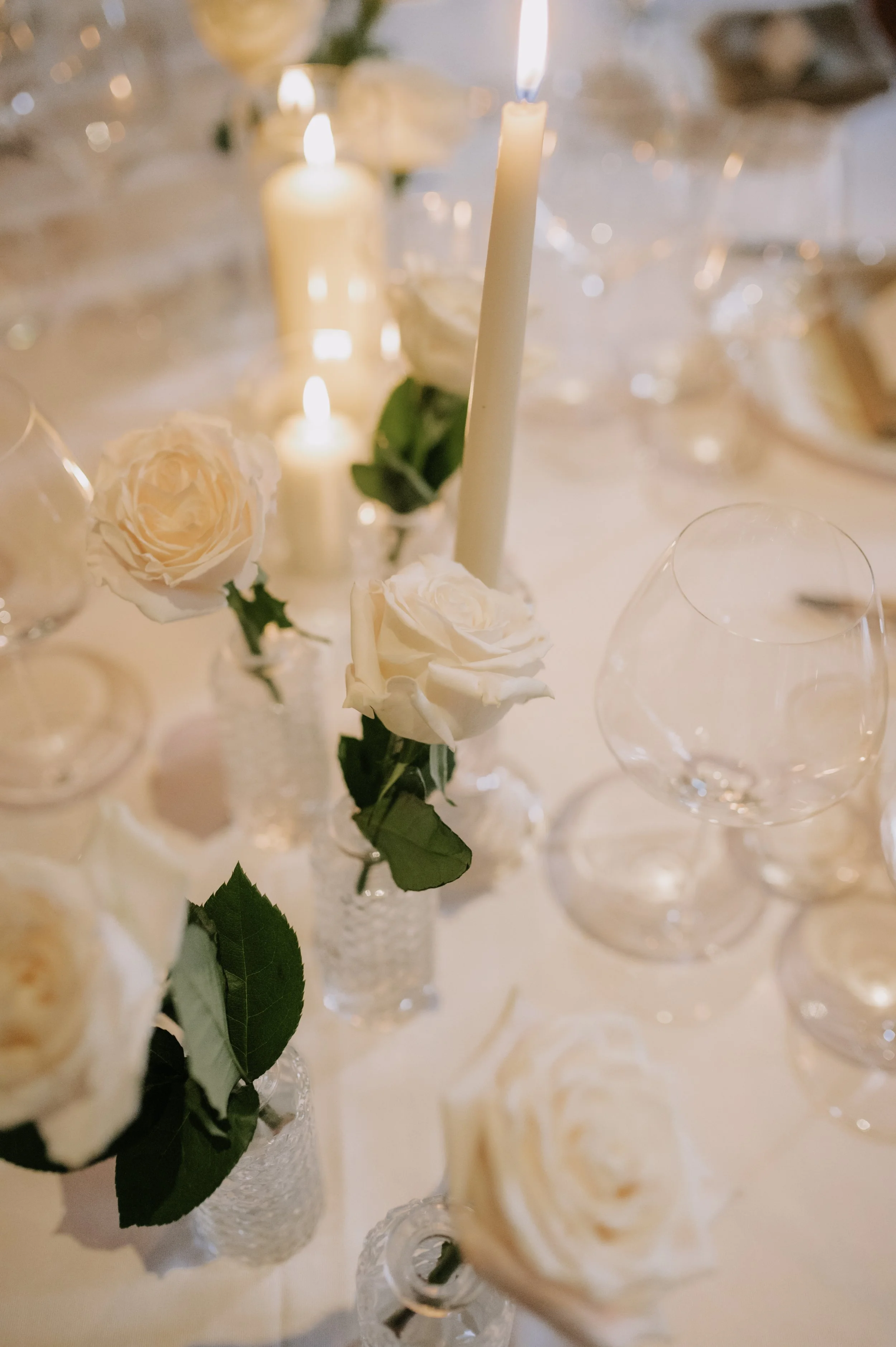 London wedding photography at Belvedere in Holland Park white roses and candles on table set up