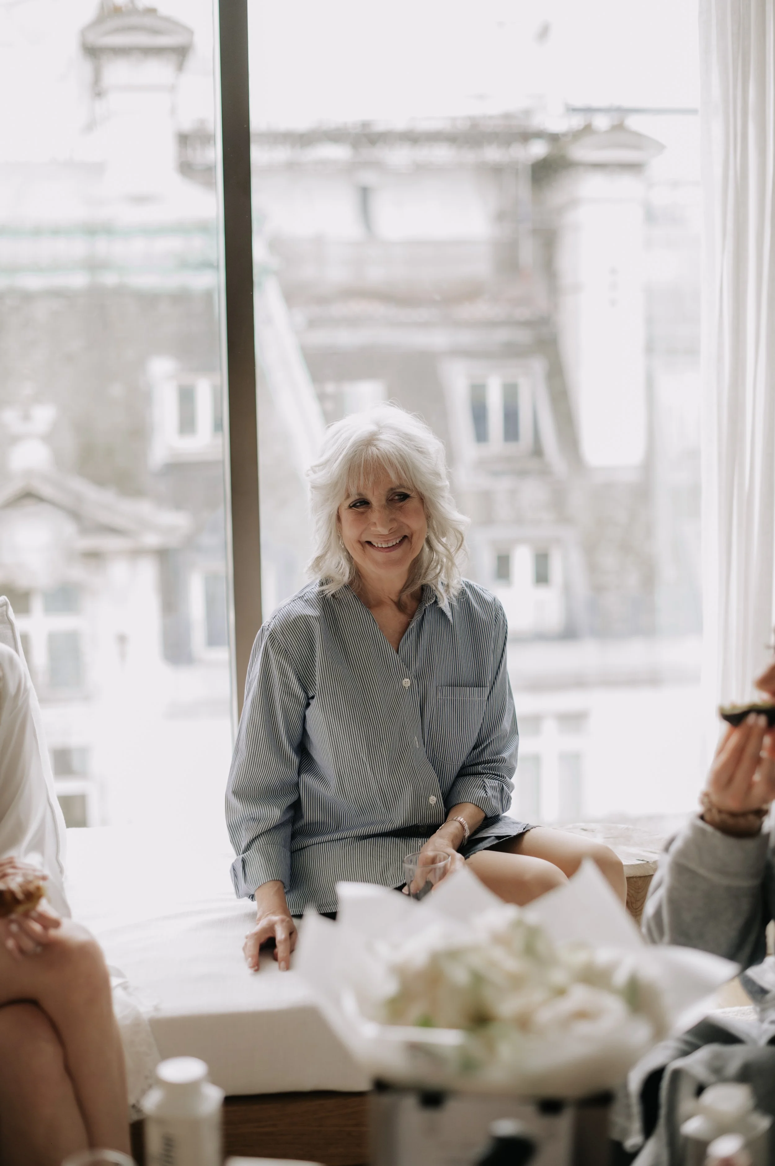 London wedding at Marylebone Town Hall step mum smiling 