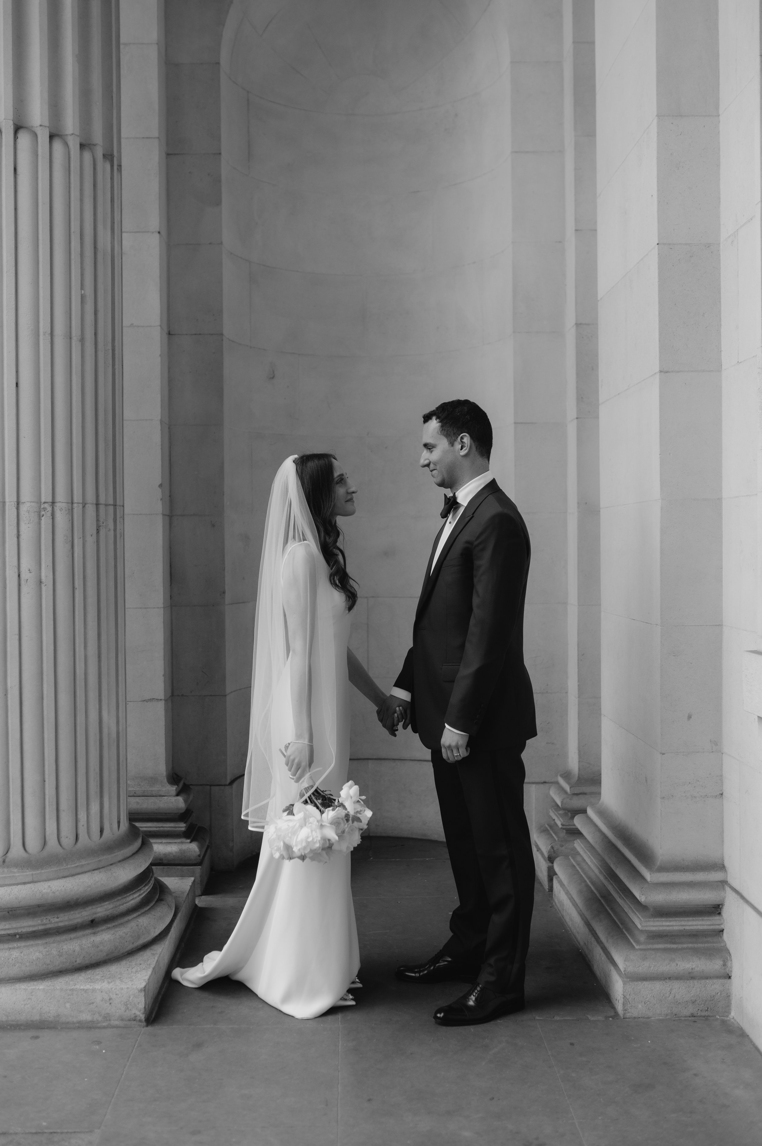 London wedding photography at Marylebone Town Hall bride and groom facing each other