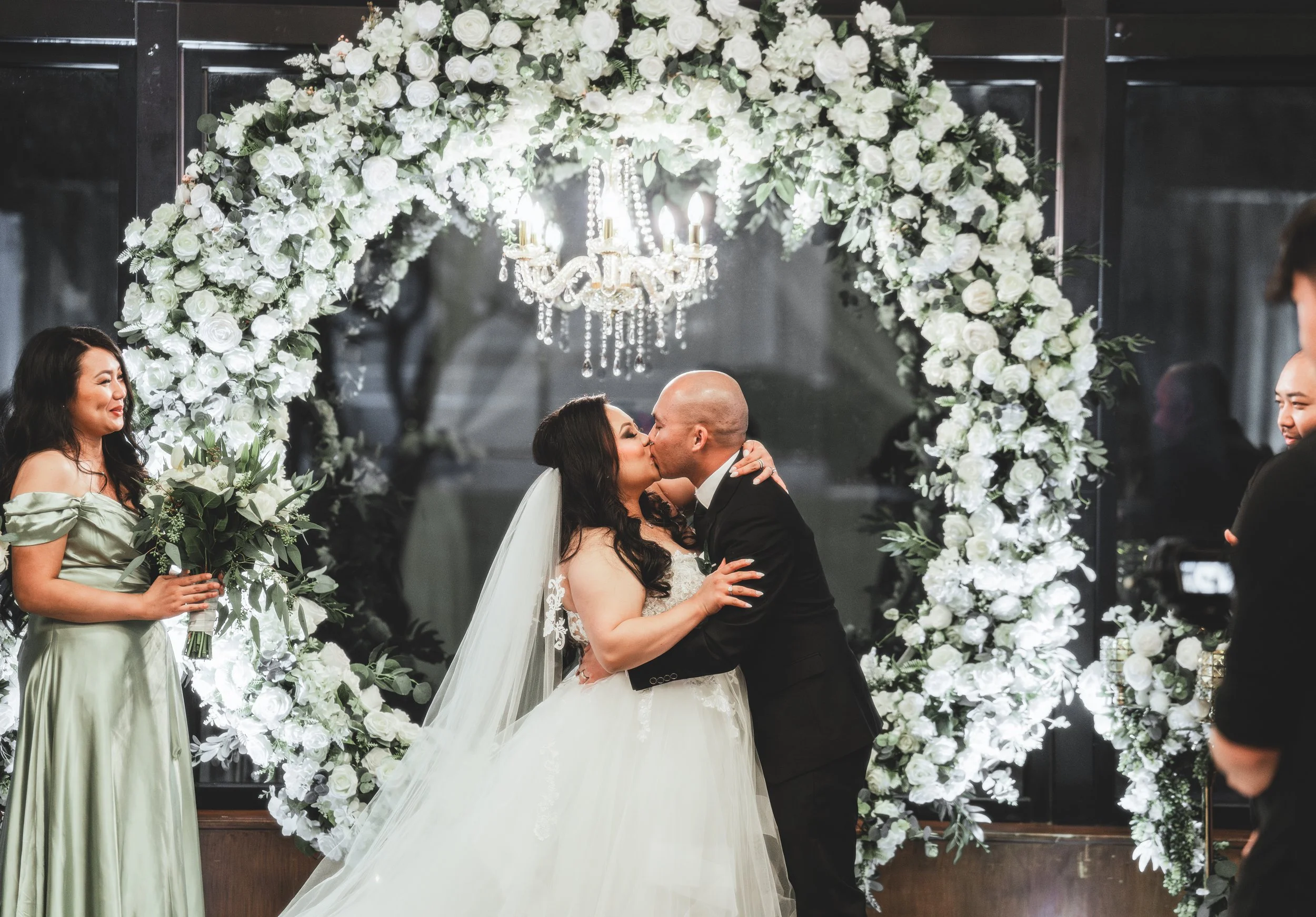 groom and bride kissing
