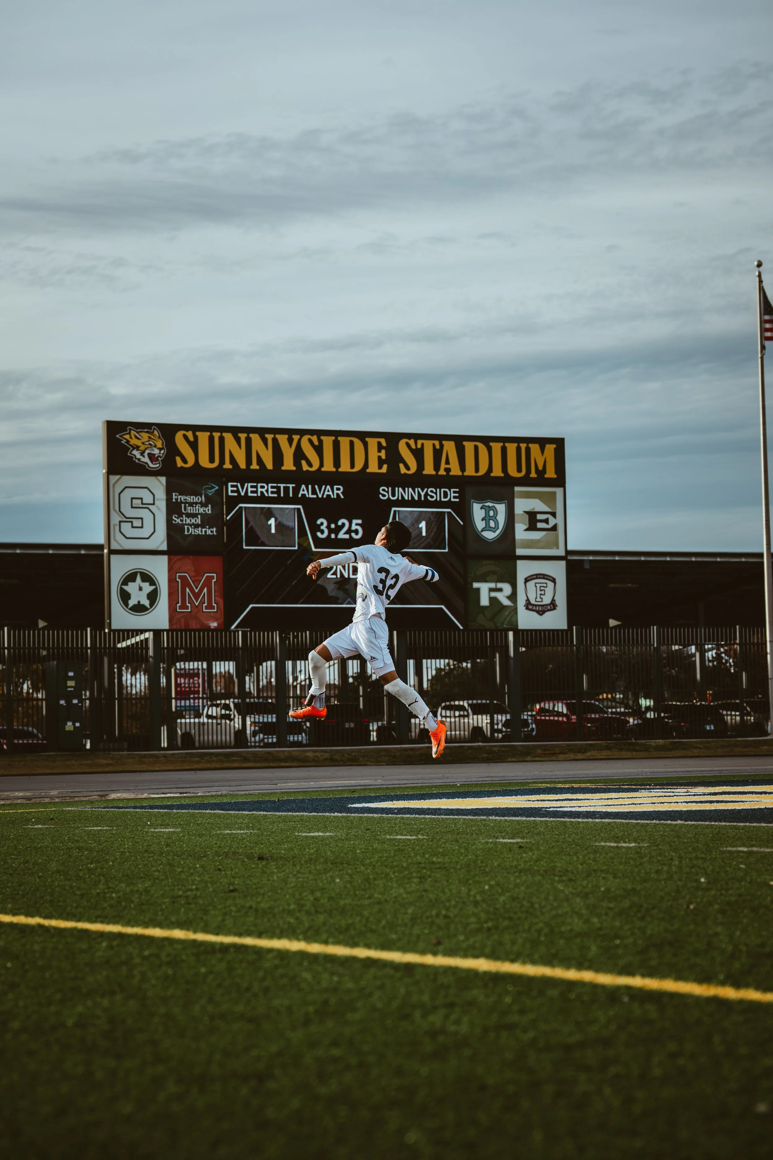man jumping after scoring goal
