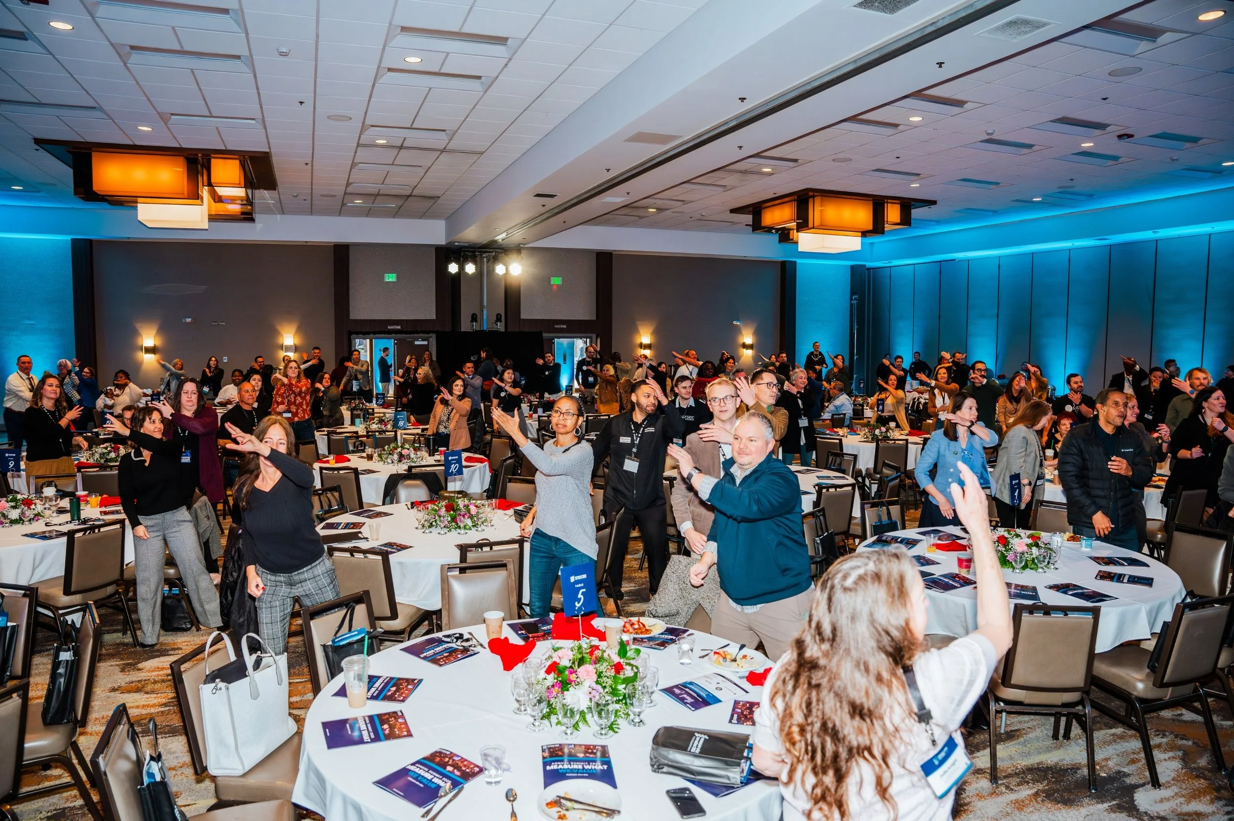 people dancing at a conference