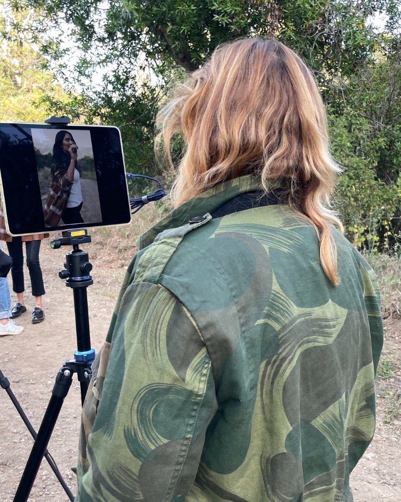 woman in camo filming, social media strategy, AD&amp;Co