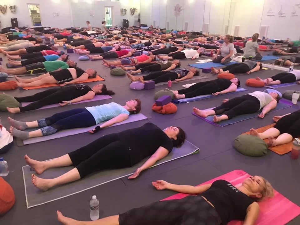 Allowing the body to rest and restore at the end of class during Shavasana
