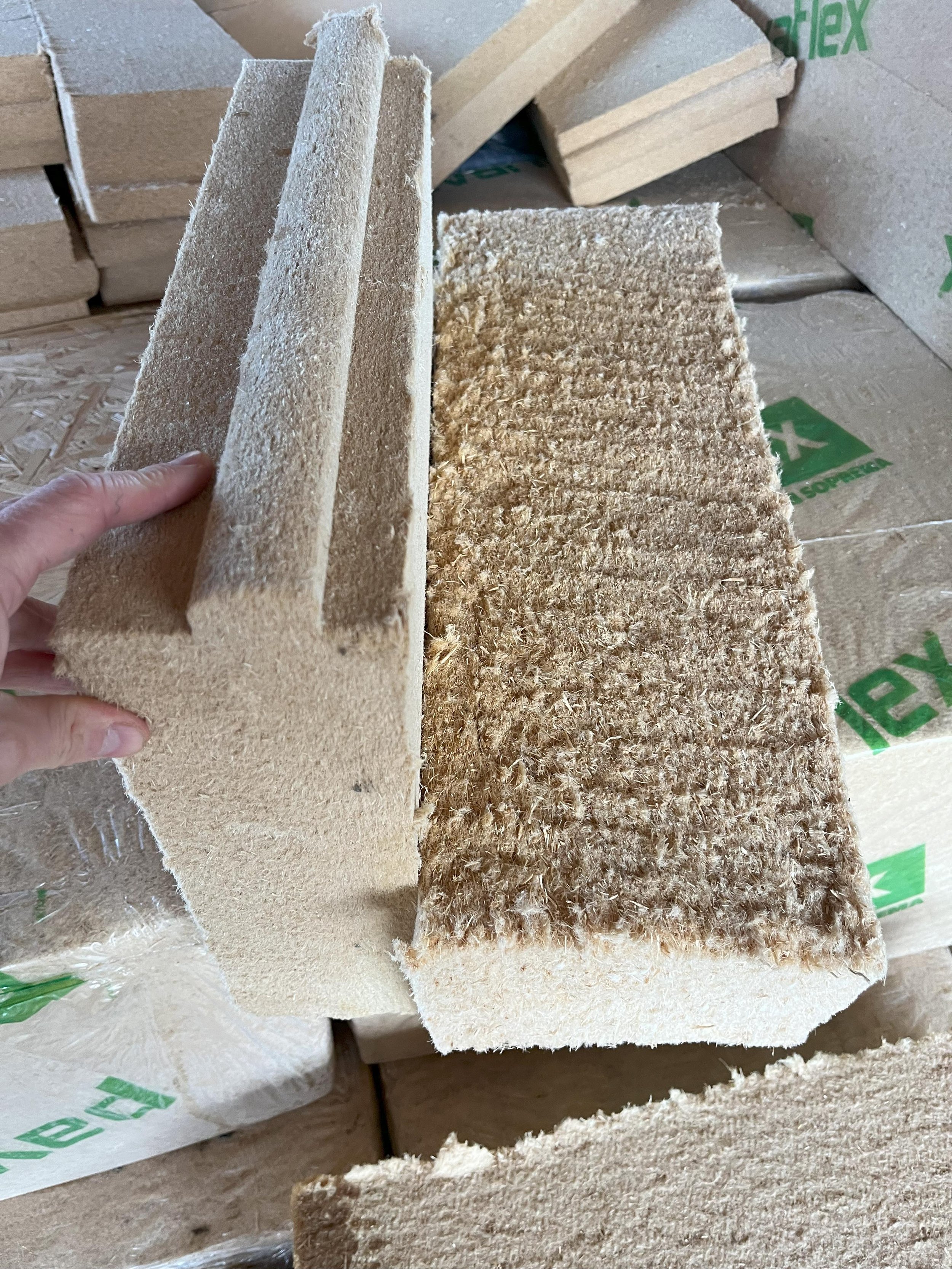 Flexible and rigid wood fibre insulation boards used in sustainable timber frame construction