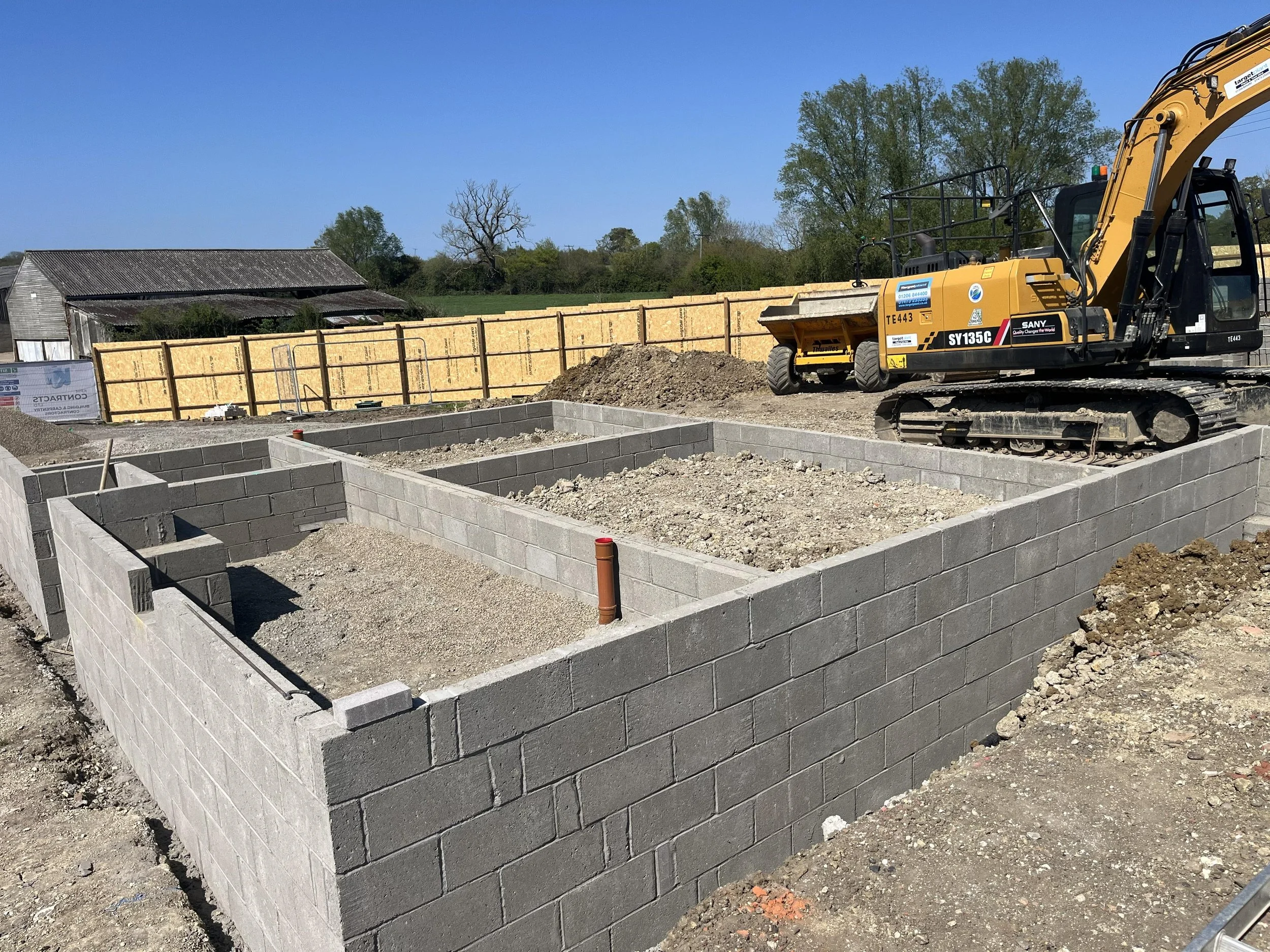 Cockfield Hall Farm under construction showing blockwork foundation walls and ground floor substructure works progressing on site 02