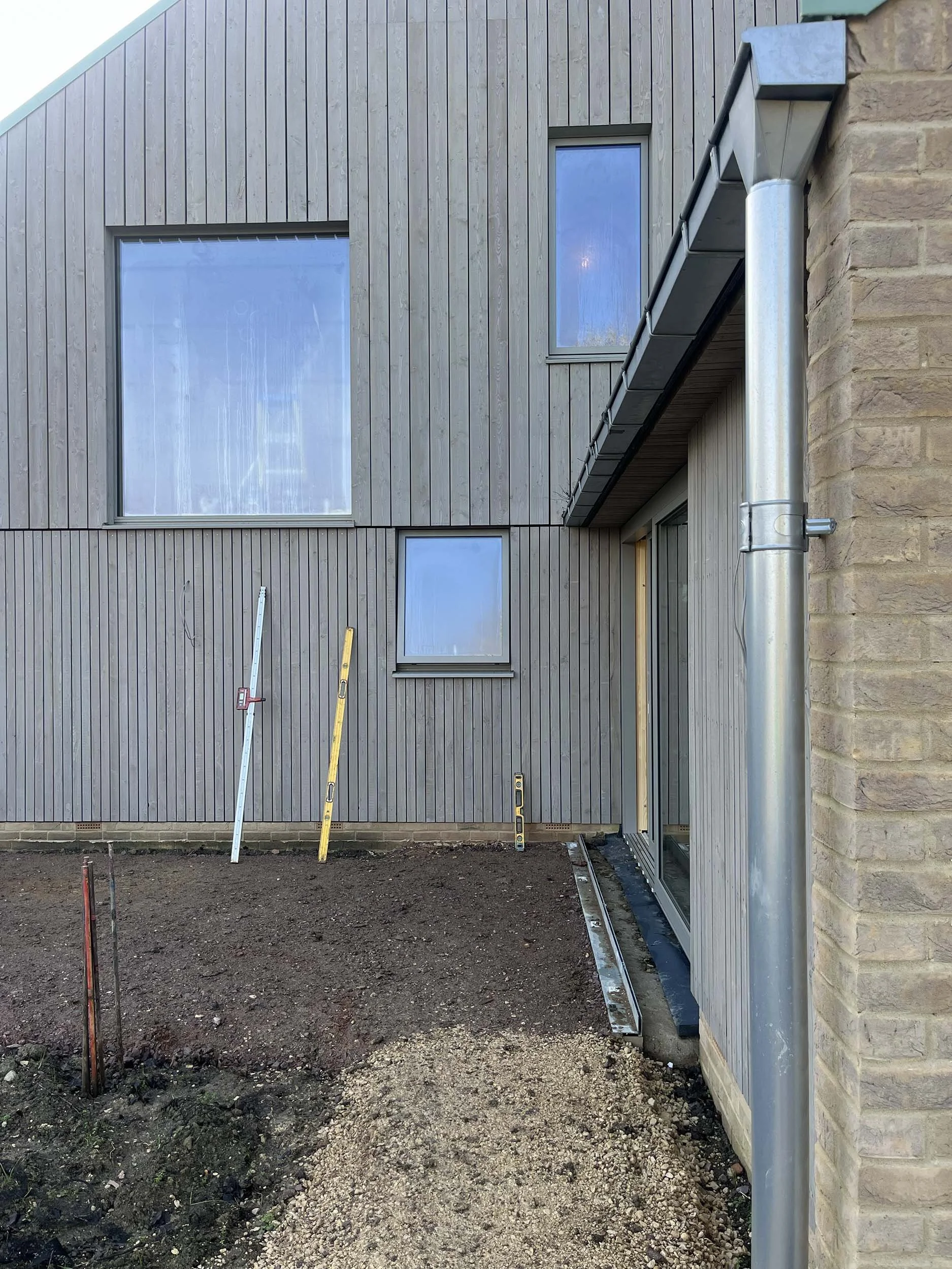Hereward House – Timber-clad courtyard elevation of certified Passive House in Aldreth, Ely, Cambridgeshire