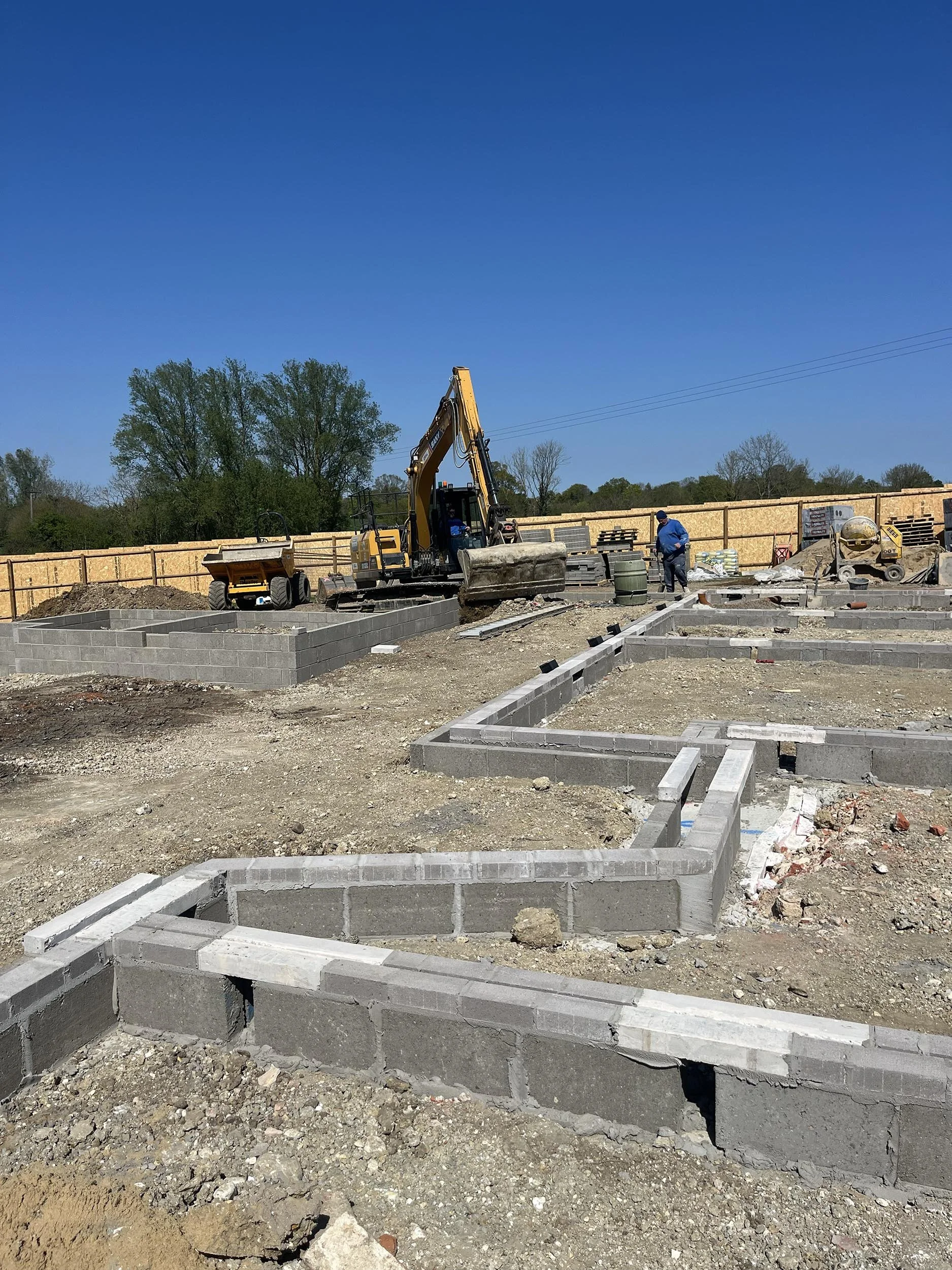 Cockfield Hall Farm under construction showing blockwork foundation walls and ground floor substructure works progressing on site 01.