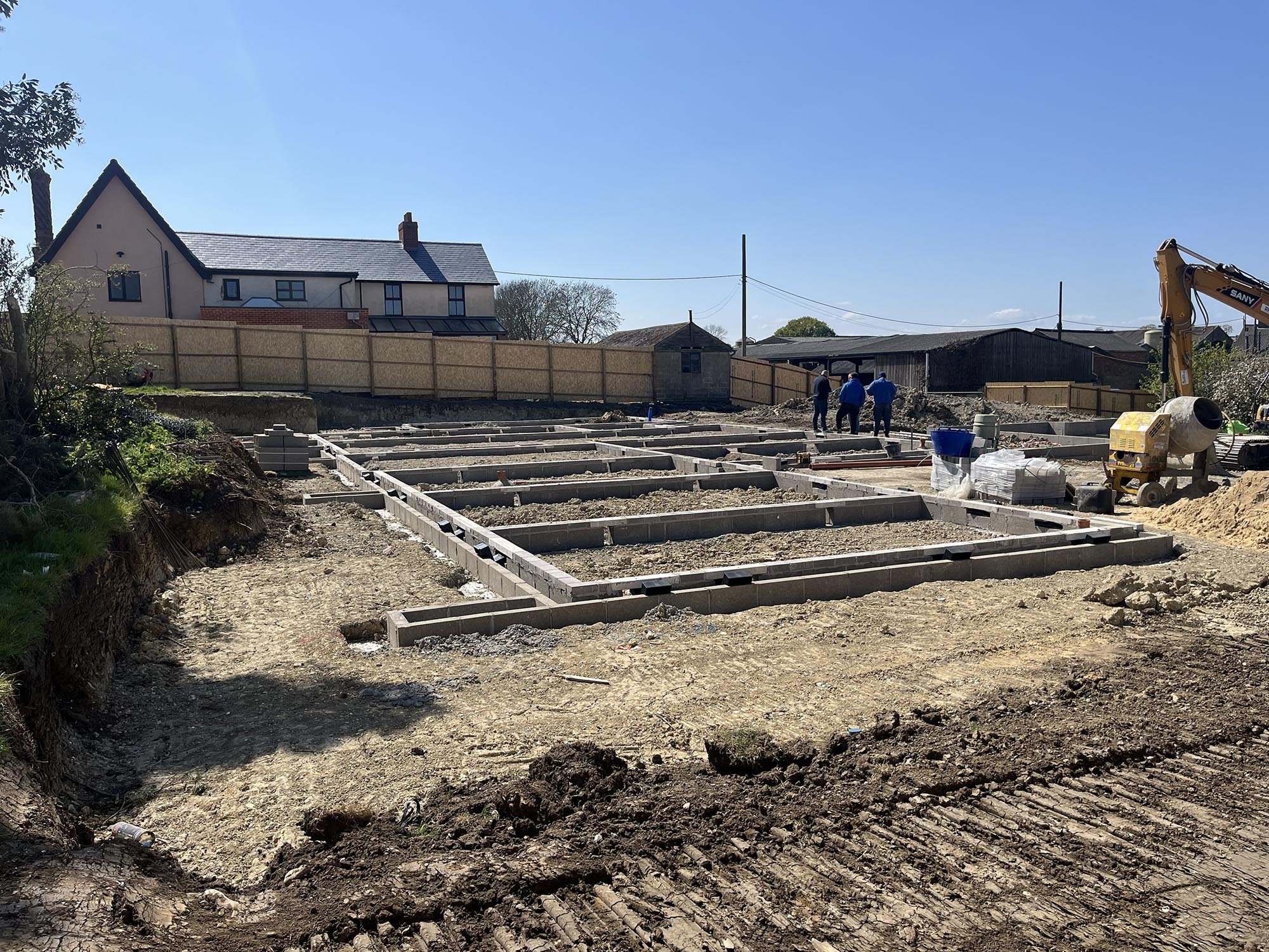 Cockfield Hall Farm under construction showing blockwork foundation walls and ground floor substructure works progressing on site 04