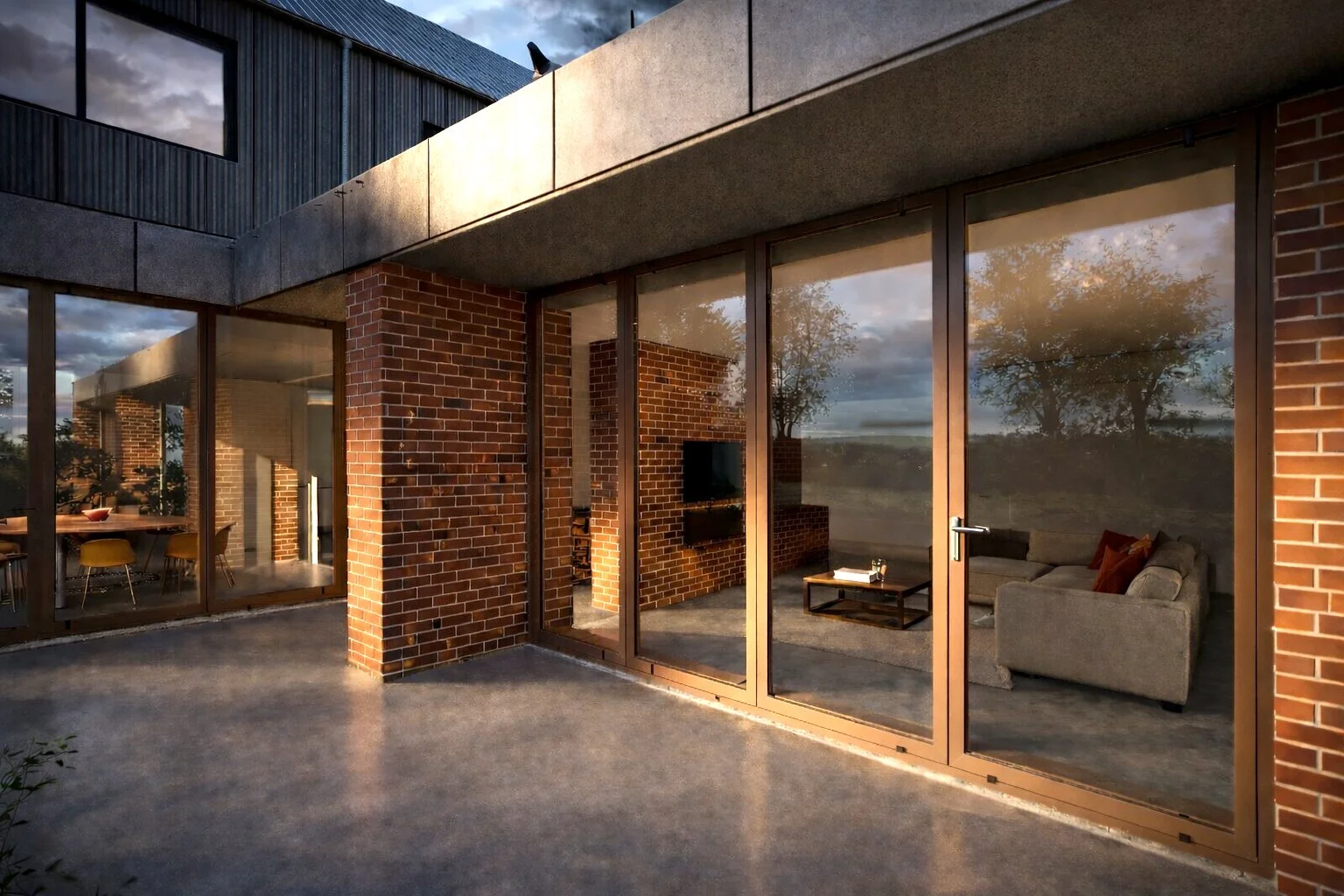Cockfield Hall Farm – Contemporary glazed courtyard elevation with brick detailing and polished screed terrace in Westerfield, Suffolk
