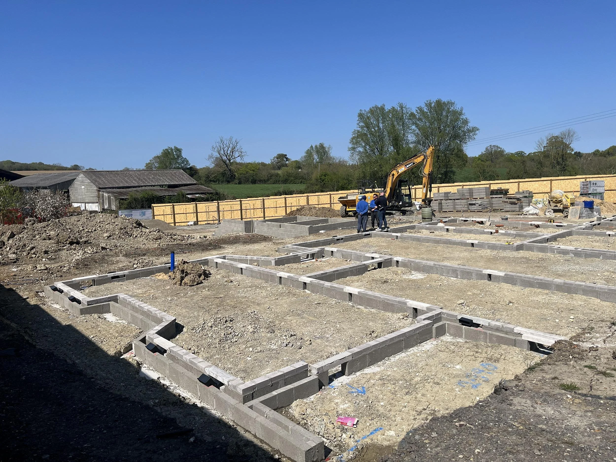 Cockfield Hall Farm under construction showing blockwork foundation walls and ground floor substructure works progressing on site 03