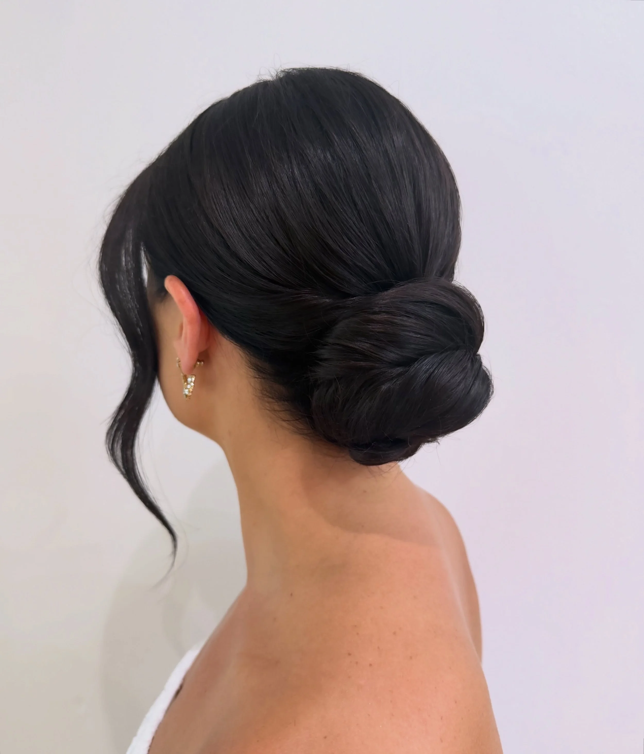 Recent bridal preview for one of my gorg fall brides✨ Can never go wrong with the classic, clean low bun!

Booking 2027! My personal availability is listed in my highlight section, as well as on the website. 
Inquire via the link in bio - pro team @n