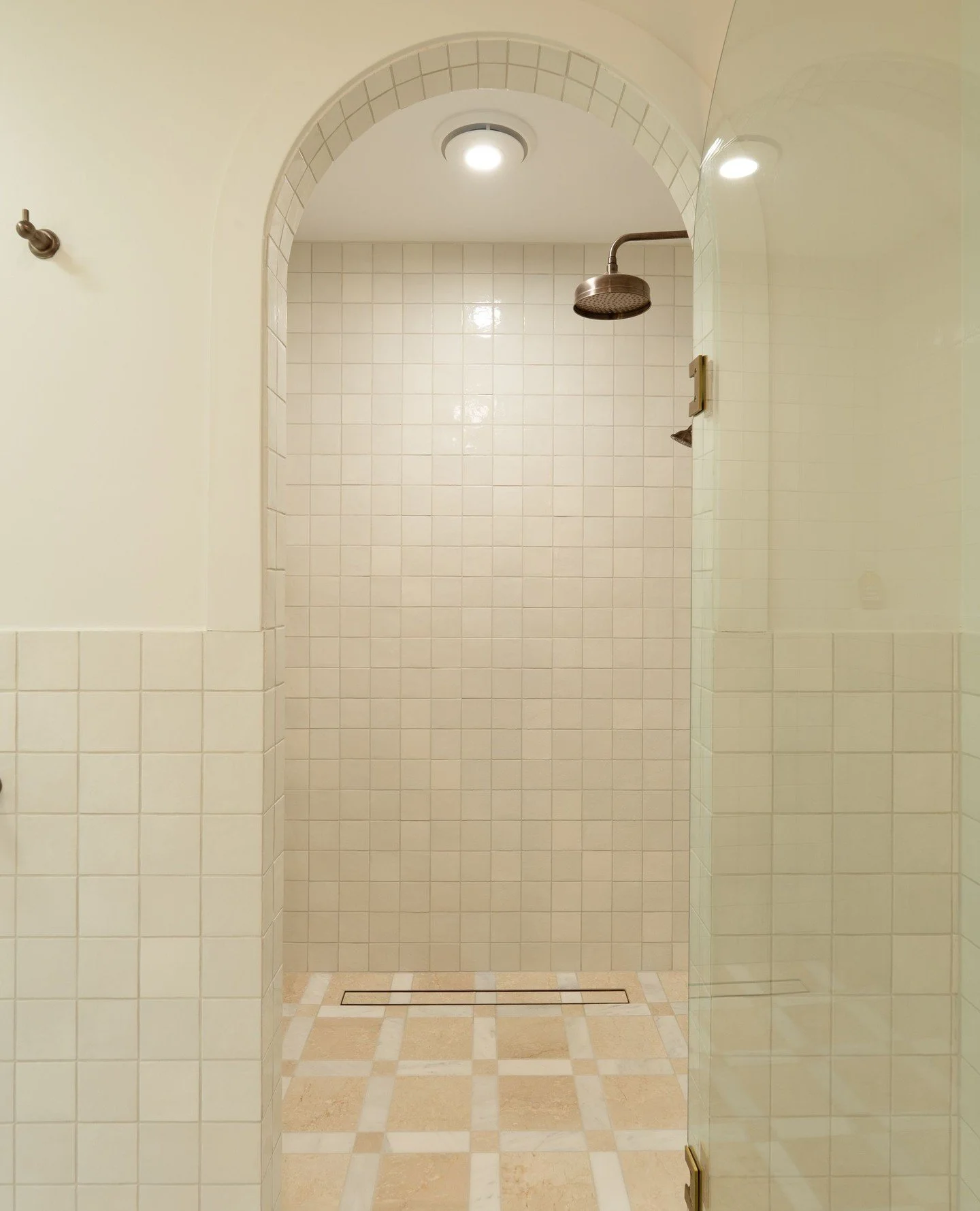 Project Willow ✨⁠
⁠
Our favourite detail from this renovation &mdash; and we think you'll see why.⁠
⁠
A shower that doesn't just exist in the bathroom &mdash; it's built into the home itself. Arched and recessed into the wall, this walk-in shower roo