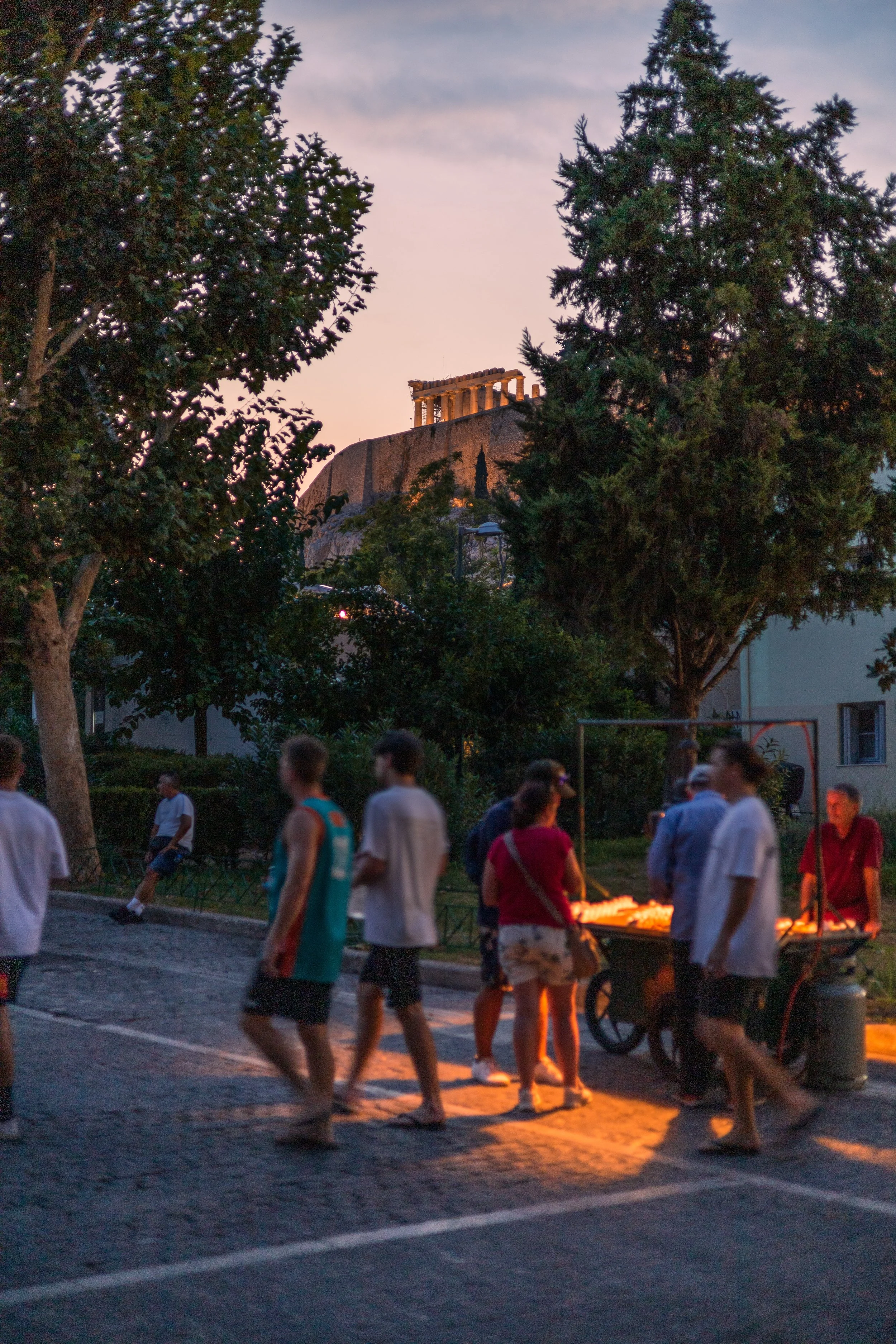 A stroll at dusk in Plaka beneath the Acropolis catching the dying rays of the August sun.