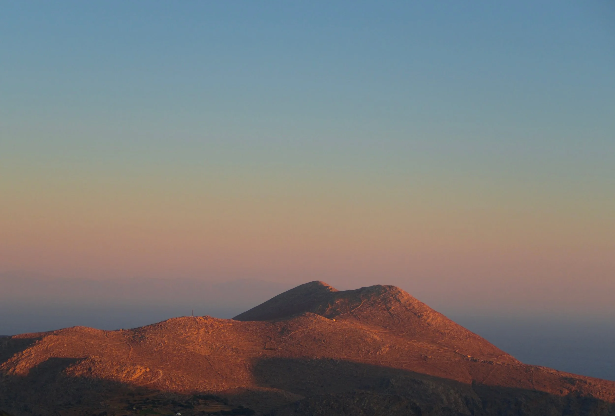 First light // Belt of Venus.
Stunning soft colours at sunrise as the first of the sun's rays hit Vouno, Amorgos.