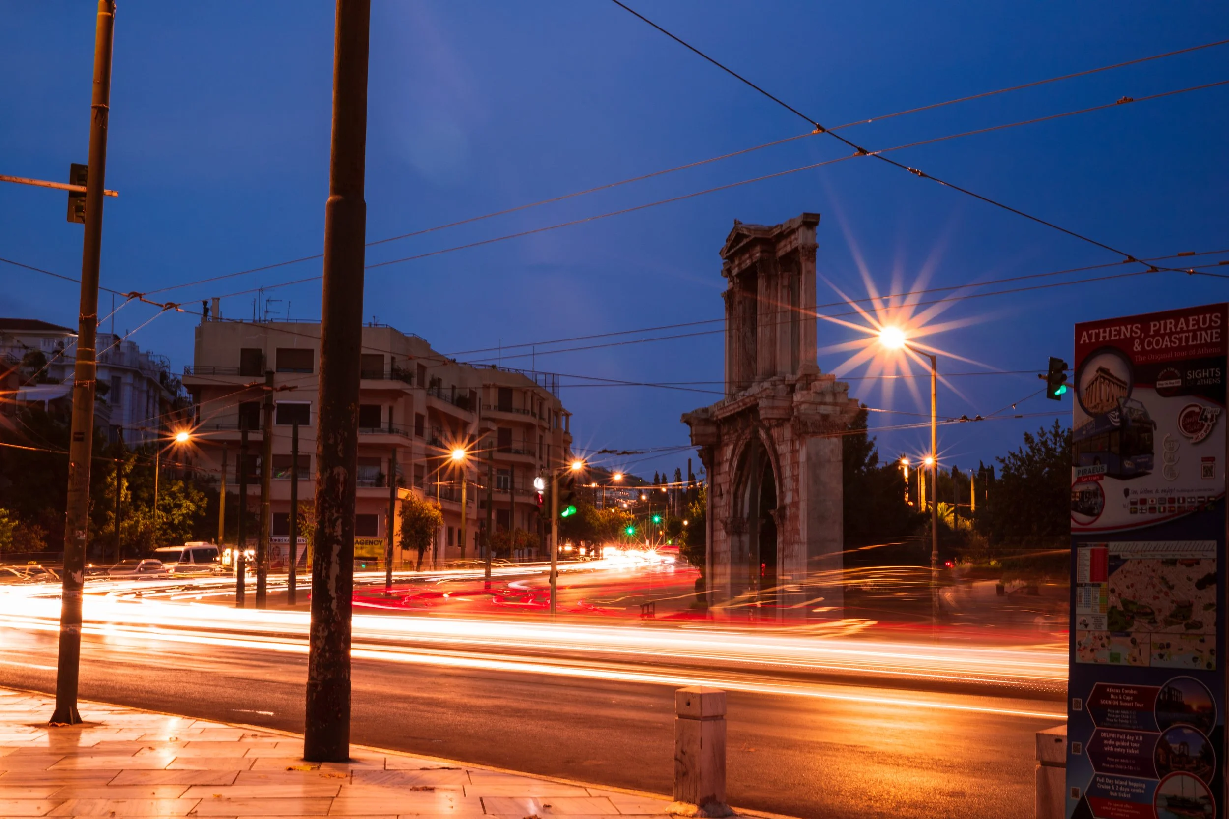 Old meets new at the Arch of Hadrian in Athens.