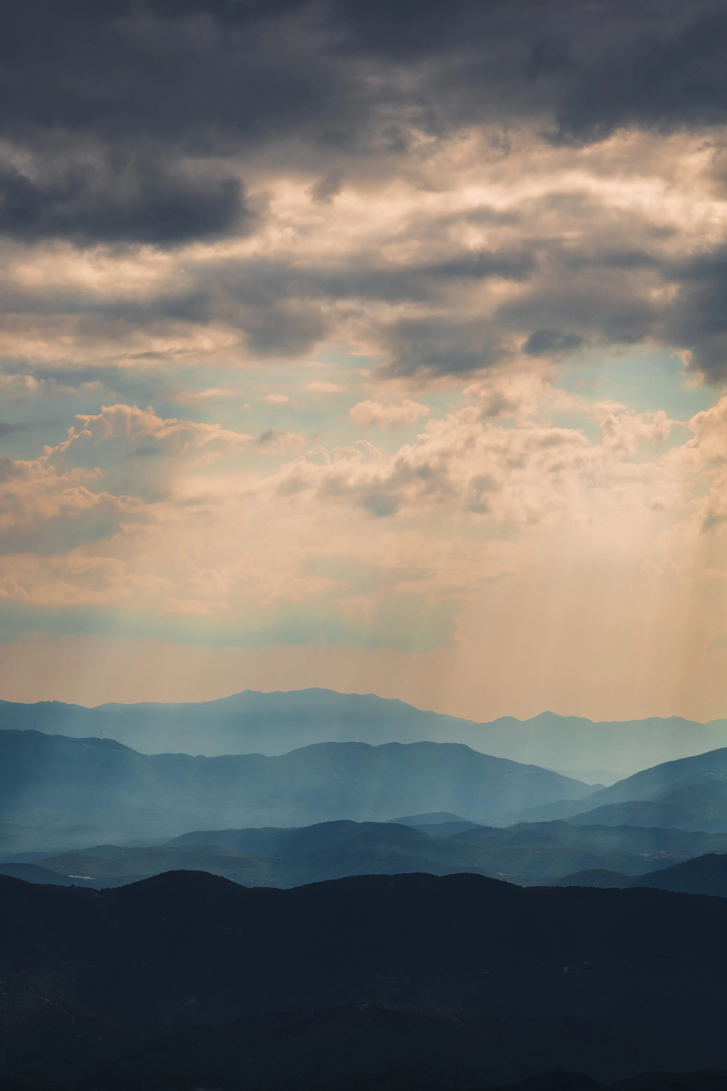 'Layers and light' - the light after the rain, cutting through the afternoon haze and illuminating the Zagori mountains stretching into the distance.