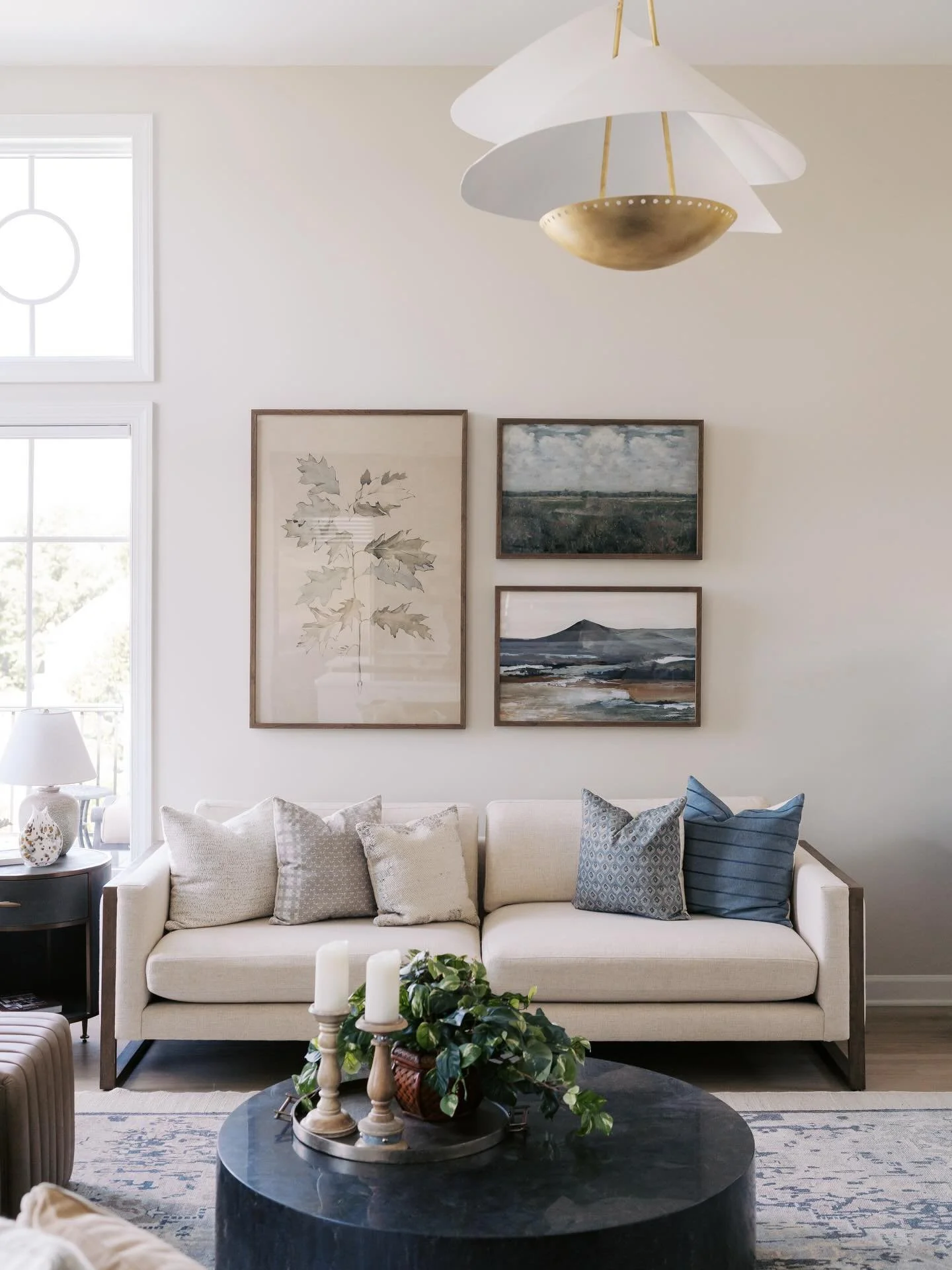 When you walk into a space and it feels good, but you can't necessarily describe why- that's balance. Your eye needs a place to settle, rest which allows your body to feel comfortable. 

This family room boasts tall ceilings that could potentially le