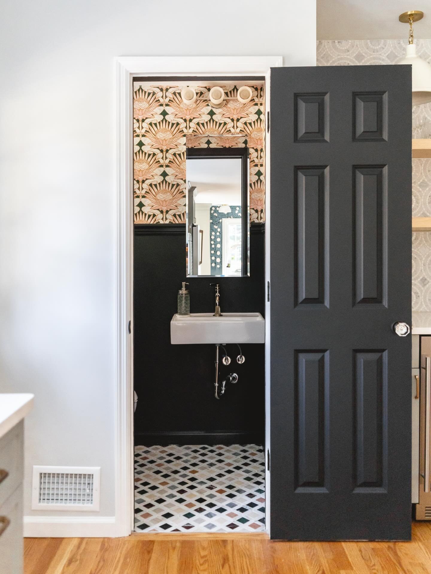 There&rsquo;s this idea that small rooms need to be painted white to feel &ldquo;open.&rdquo;

This is one concept I learned in desisgn school, and actually remember the professor who told me this concept.

A powder room is one of those spaces where 