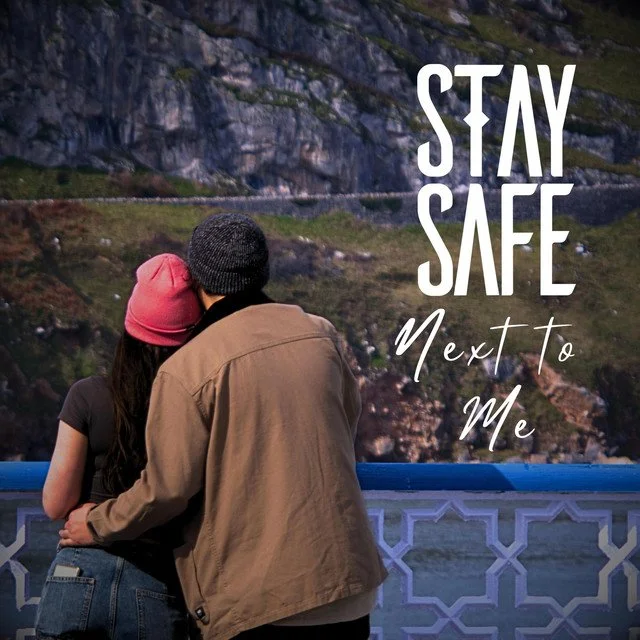 Next to Me downloaded from SpotiSongDownloader.jpg