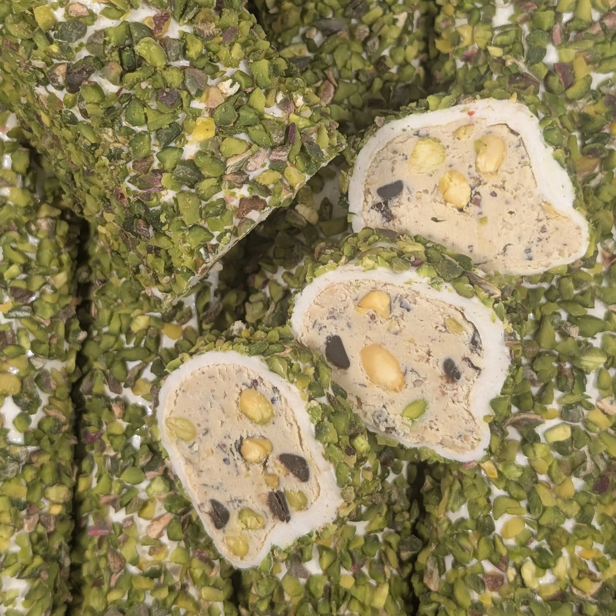 Capturing the melting hazelnut cream center of our premium pistachio Turkish Delight.
