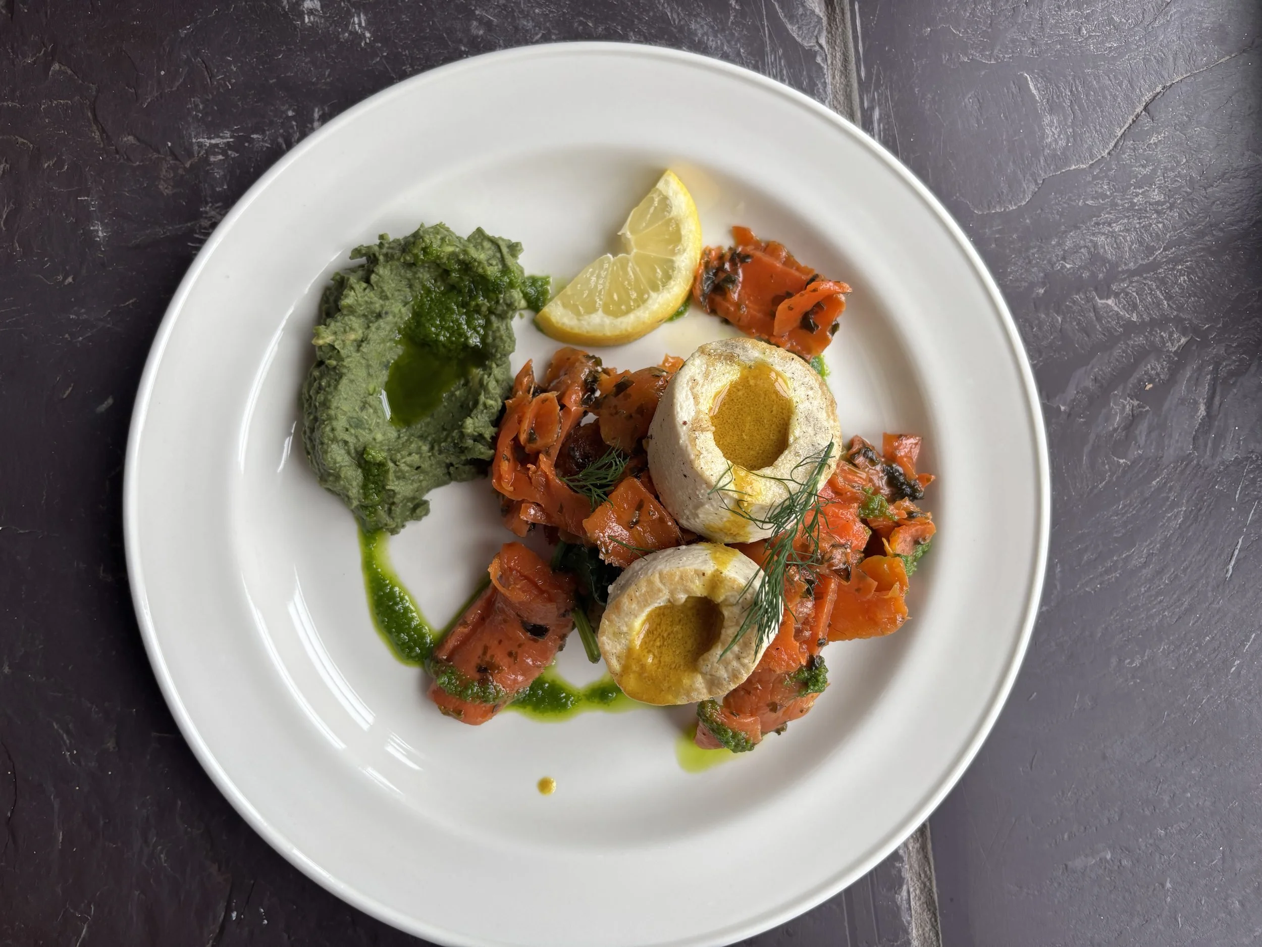 A beautifully plated vegan meal prepared by Earthly Feasts at a wellness retreat in North Wales, featuring seasonal and nourishing ingredients