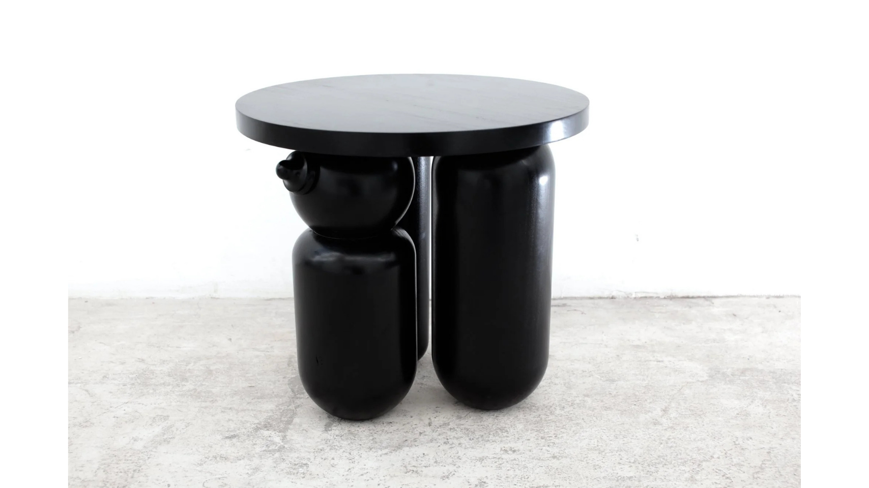 The 'Mammy' by Simone Brewster. A handcarved stool conceptualised by artist Simone Brewster. The 'Mammy' is a scupltural furniture piece that draws on historical decorative objects, colonial furniture and representations of Black women in art history