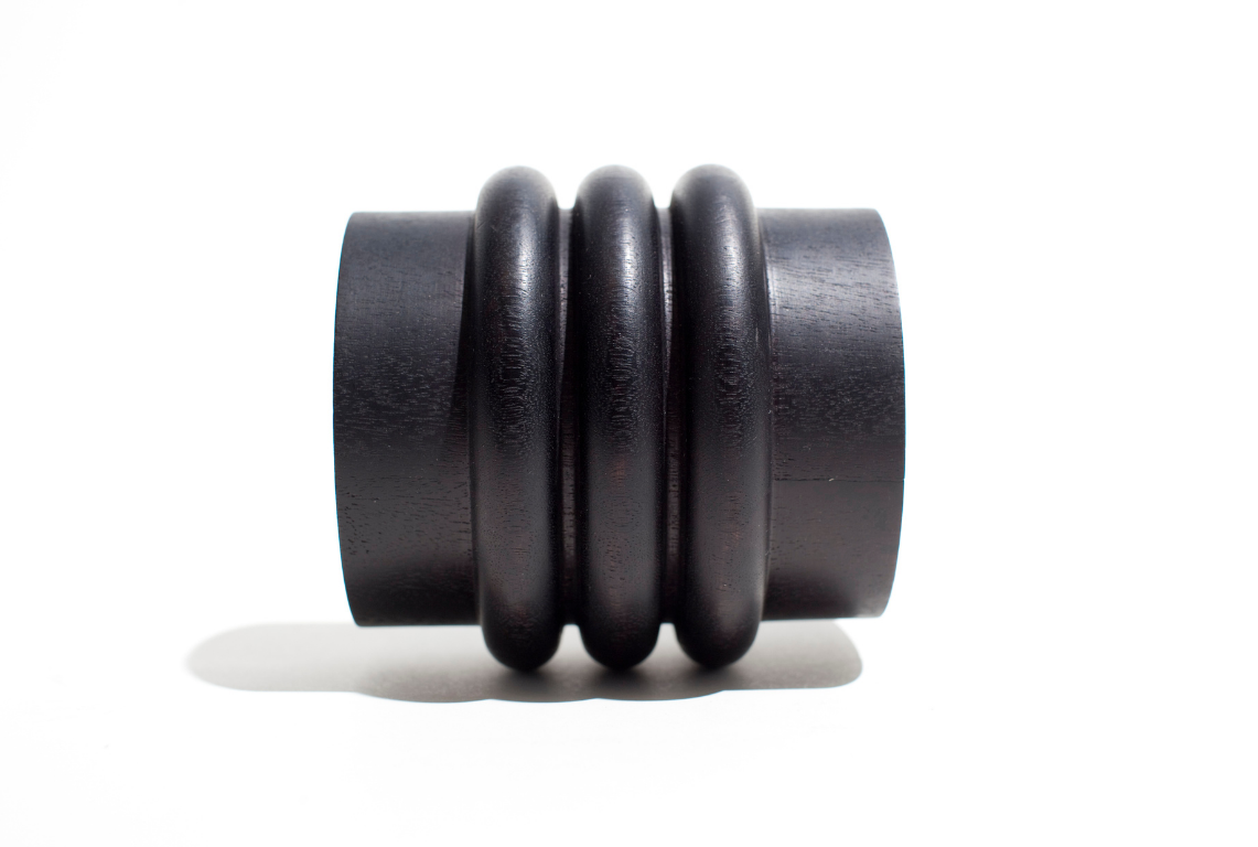 A bracelet by Simone Brewster crafted out of wood