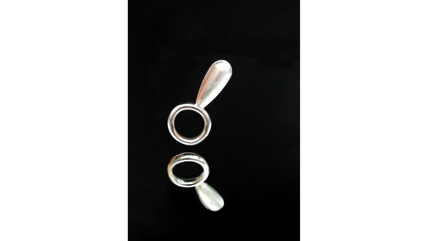 Silver ring by Simone Brewster shown in different angles