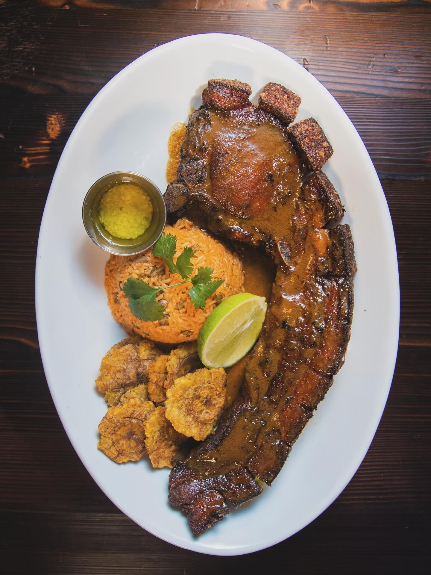 Chuleta Kan Kan: the pork chop with presence. A crispy crown of Puerto Rican flavor. 🇵🇷 💃🏼

📍8324 3rd Ave
puertasrestaurant.com/reservations #linkinbio