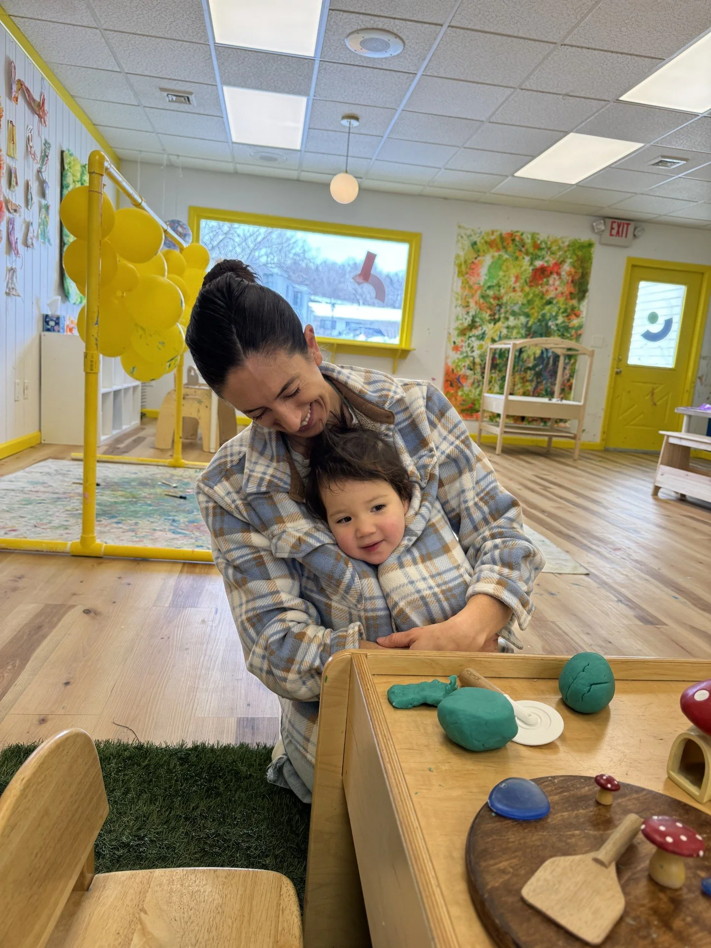 teacher and toddler at sensory art studio