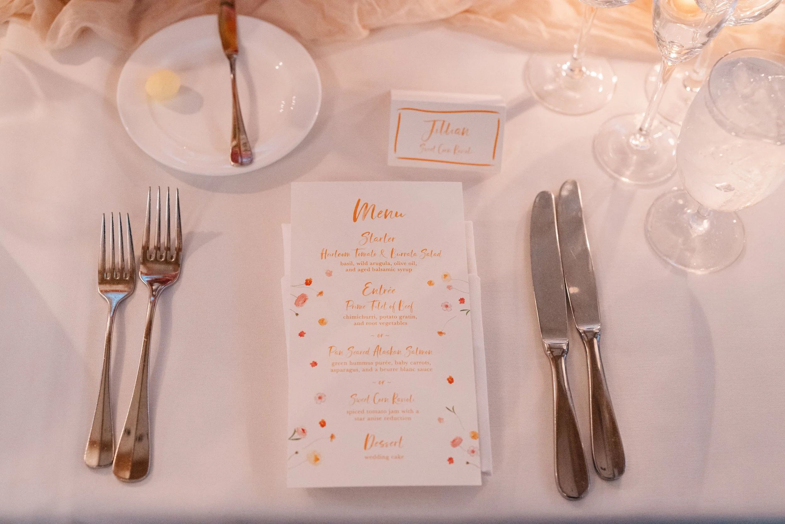 Custom menu cards and personalized place cards by Say Hello Designs.