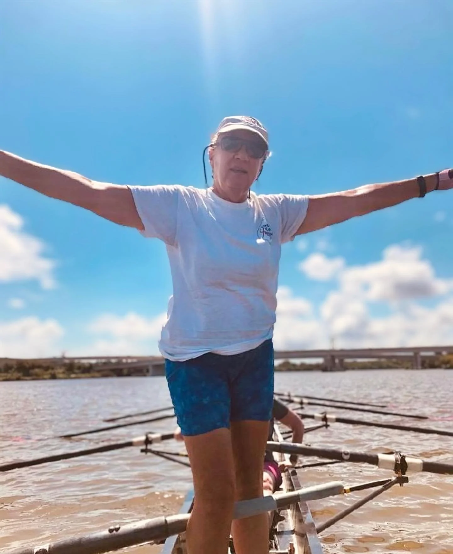 Doris standing in the boat 2024.jpg