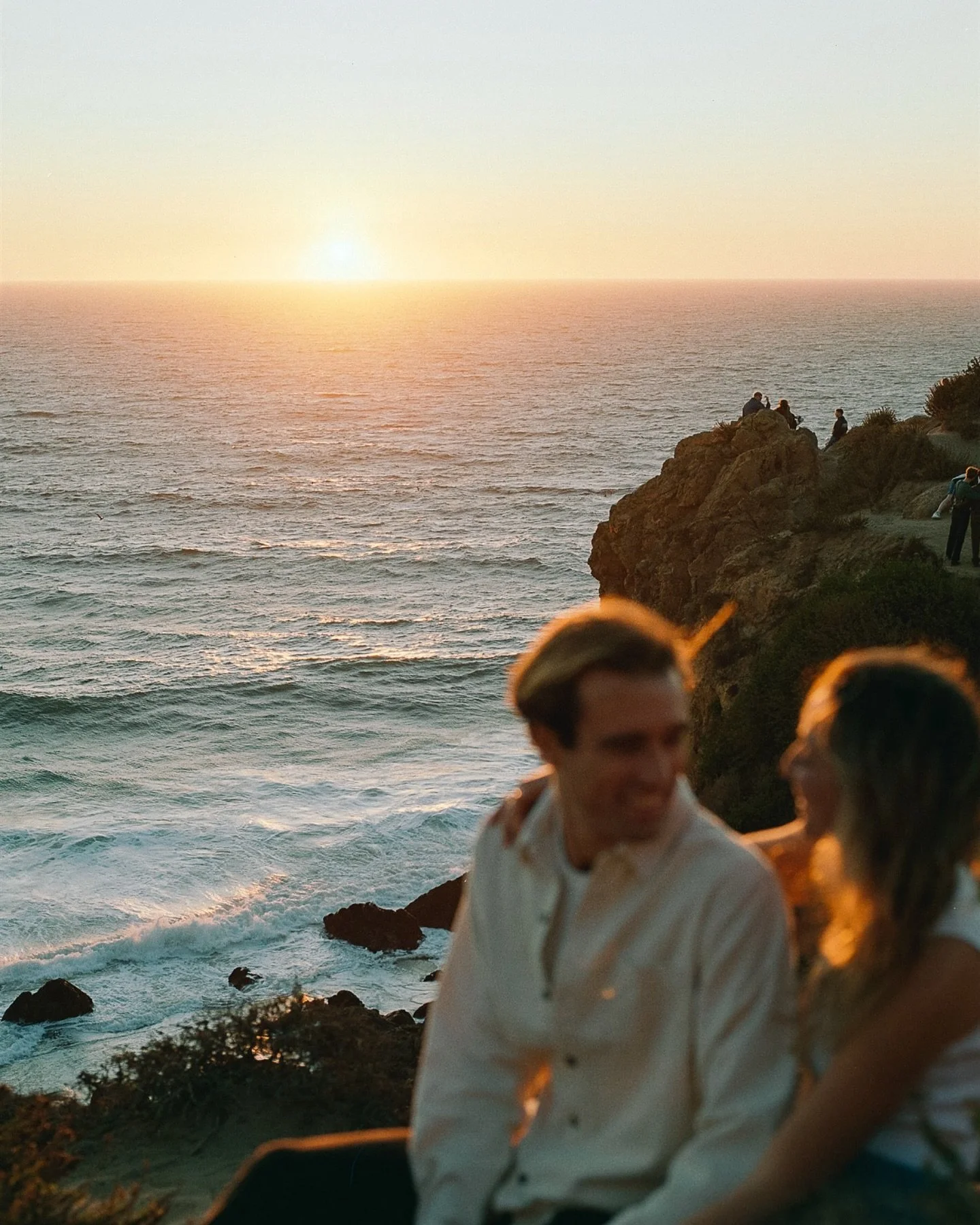 From last year about this time on the perfect little Malibu date night (prior to the fires). Paired with my latest hyper fixation song that goes so perfectly with this session. 💕

Miss you @inbalh &amp; @tymorley__ ❤️

#malibuengagementphotos #lawed