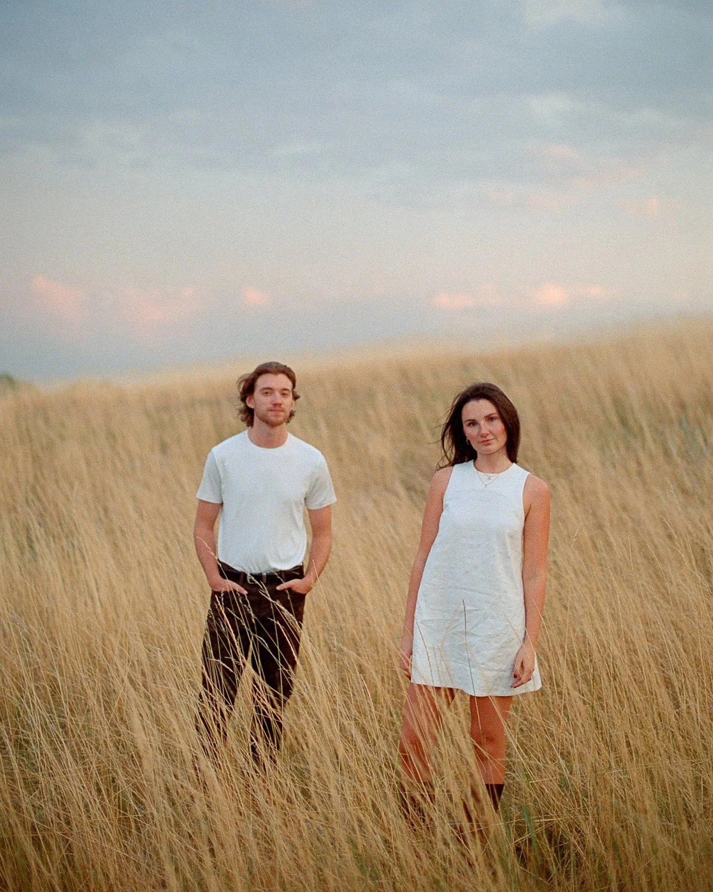 We were loosing it over the sky this whole session. Sometimes all you need is an open field and and a simple sunset. And chemistry like this doesn&rsquo;t hurt either. Can&rsquo;t wait for your wedding day next year A&amp;B! 

#coloradoweddingphotogr