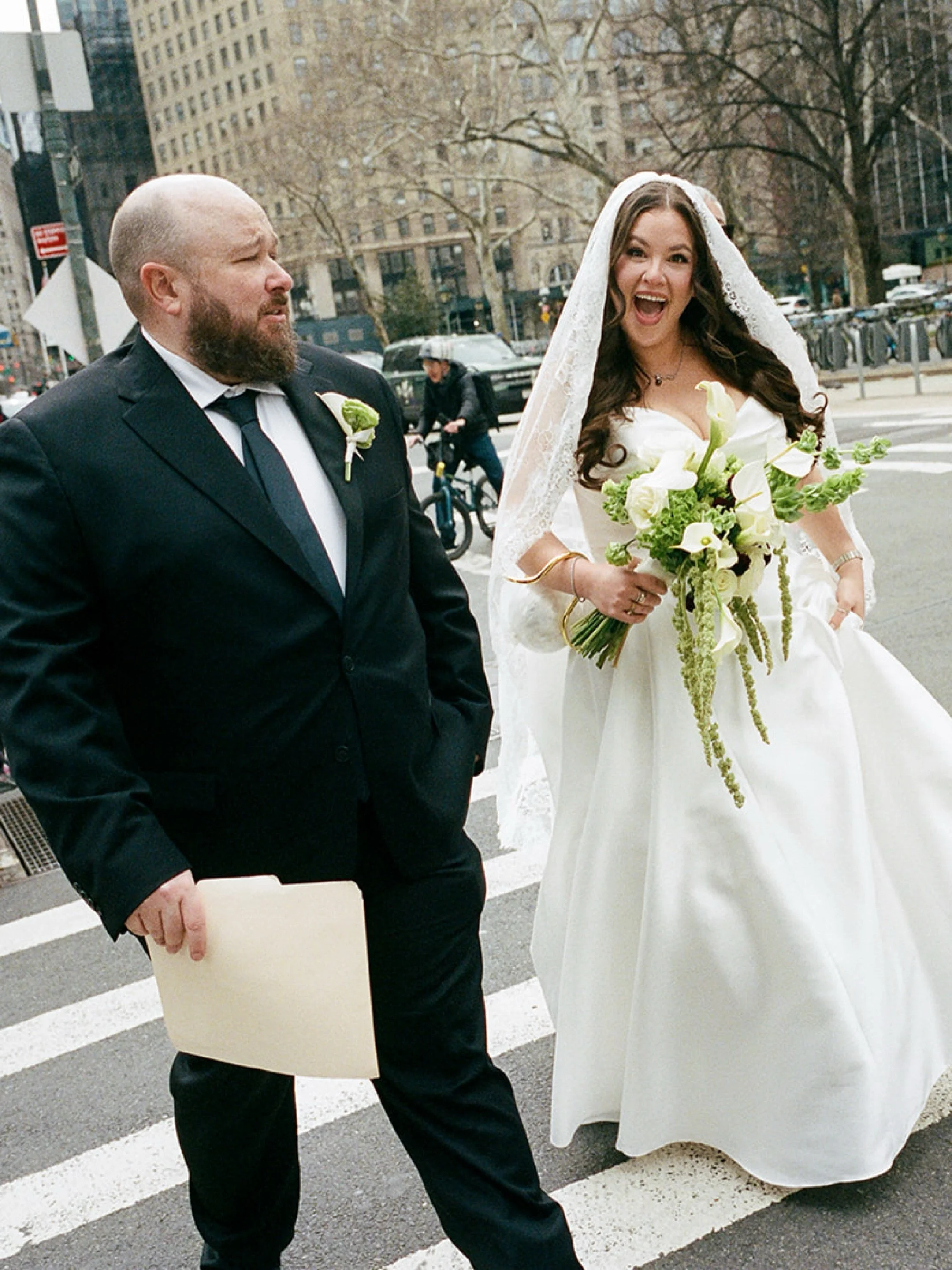 Sarah &amp; Derek in NYC. An intimate day with family in the city. Small and intentional. The couple started their wedding day together folding their 1,000th paper crane( the rest of which will be on display at their summer reception) , then a family