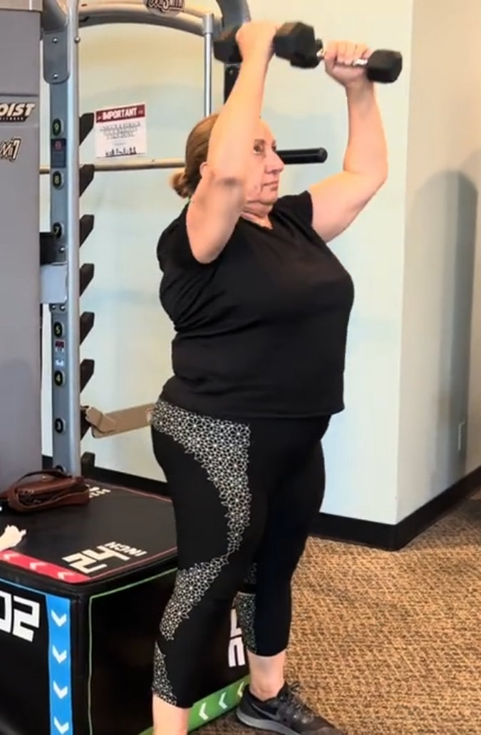 woman over 40 doing strength and mobility exercises
