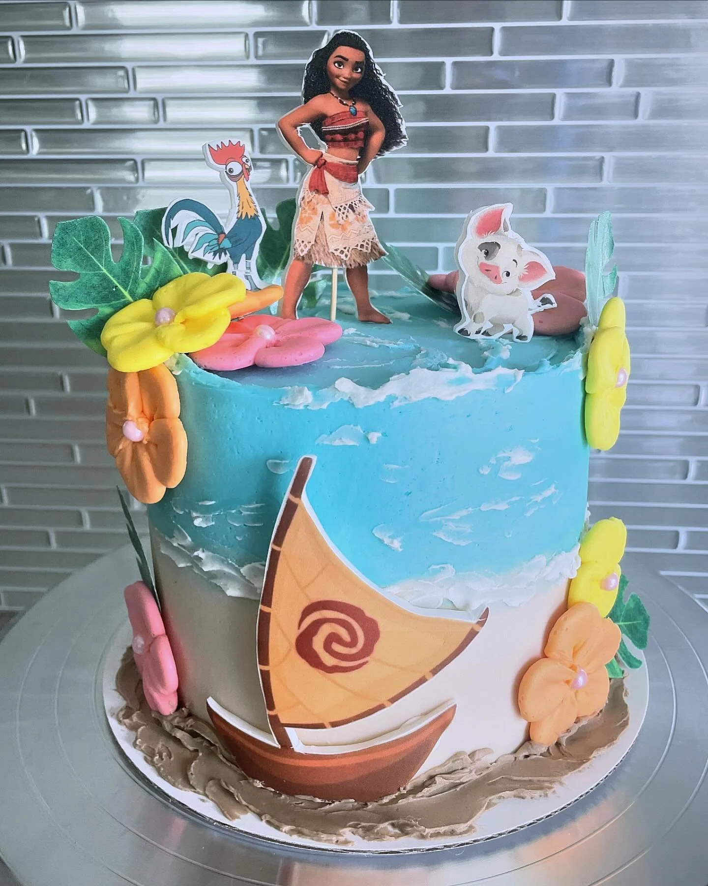 🌺🌸 MOANA Birthday Cake 🌸🌺 

Surprise sprinkle filled cake with vanilla buttercream,  buttercream flowers and edible icing prints.

#sweettsmuskoka #bakinglove #cakesofinstagram #bakingtherapy #instacakes #cakestagram #sprinklesurprise #buttercrea