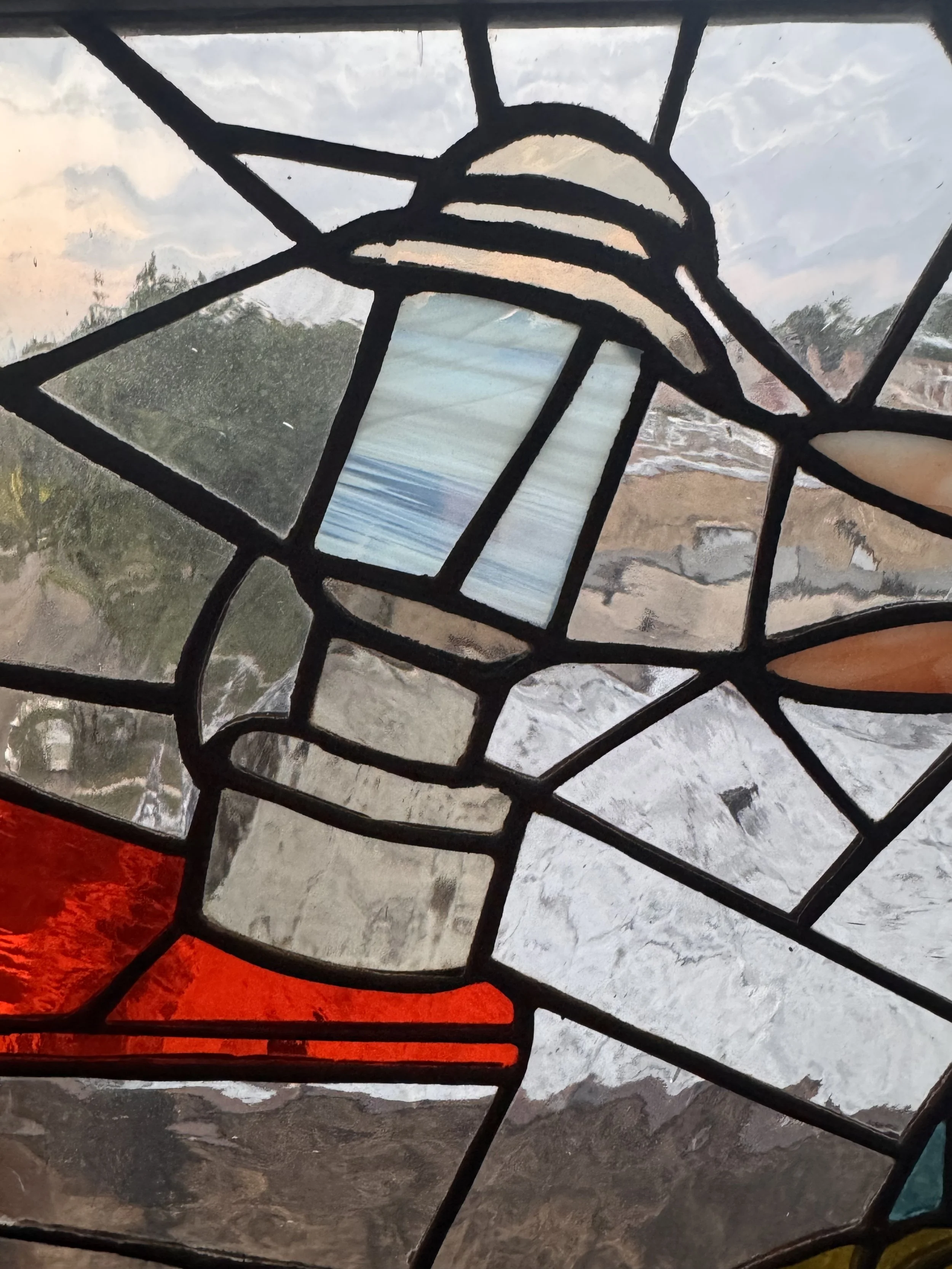 Namast3 detail of lamp teetering on table edge