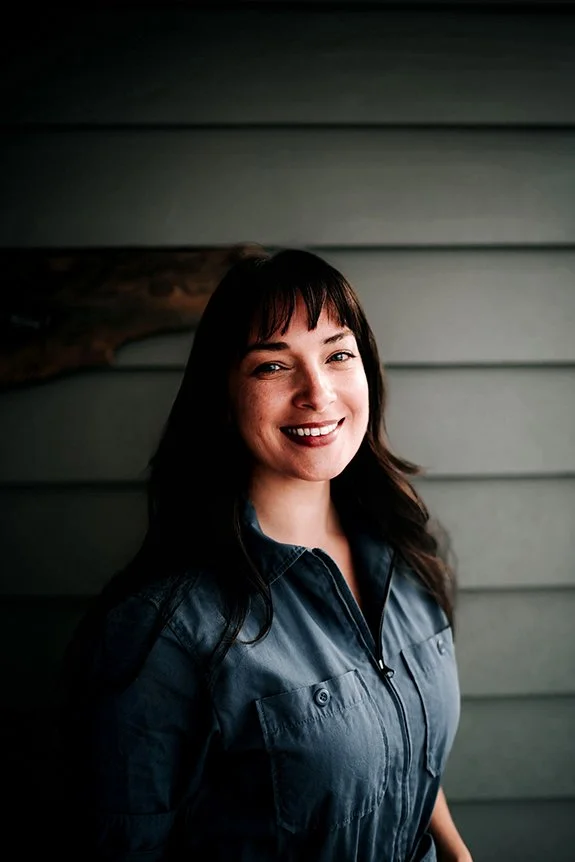 A female gynecologist poses for a headshot at Borealis LIFE in Alaska.