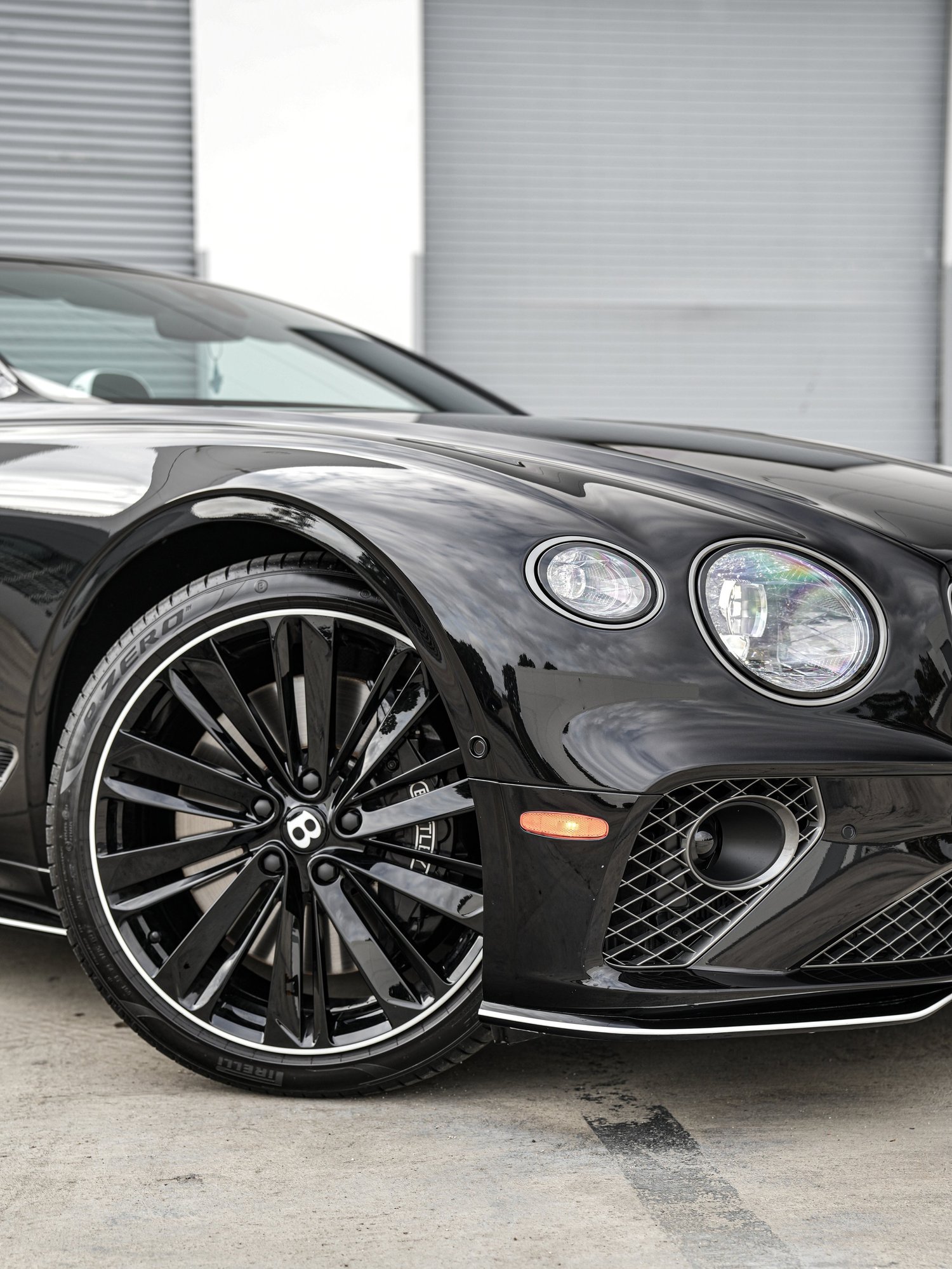 Bentley Continental GTC Film Noir after Paint Protection Film (PPF), Window Tint and Ceramic Coating, front wheel and body view