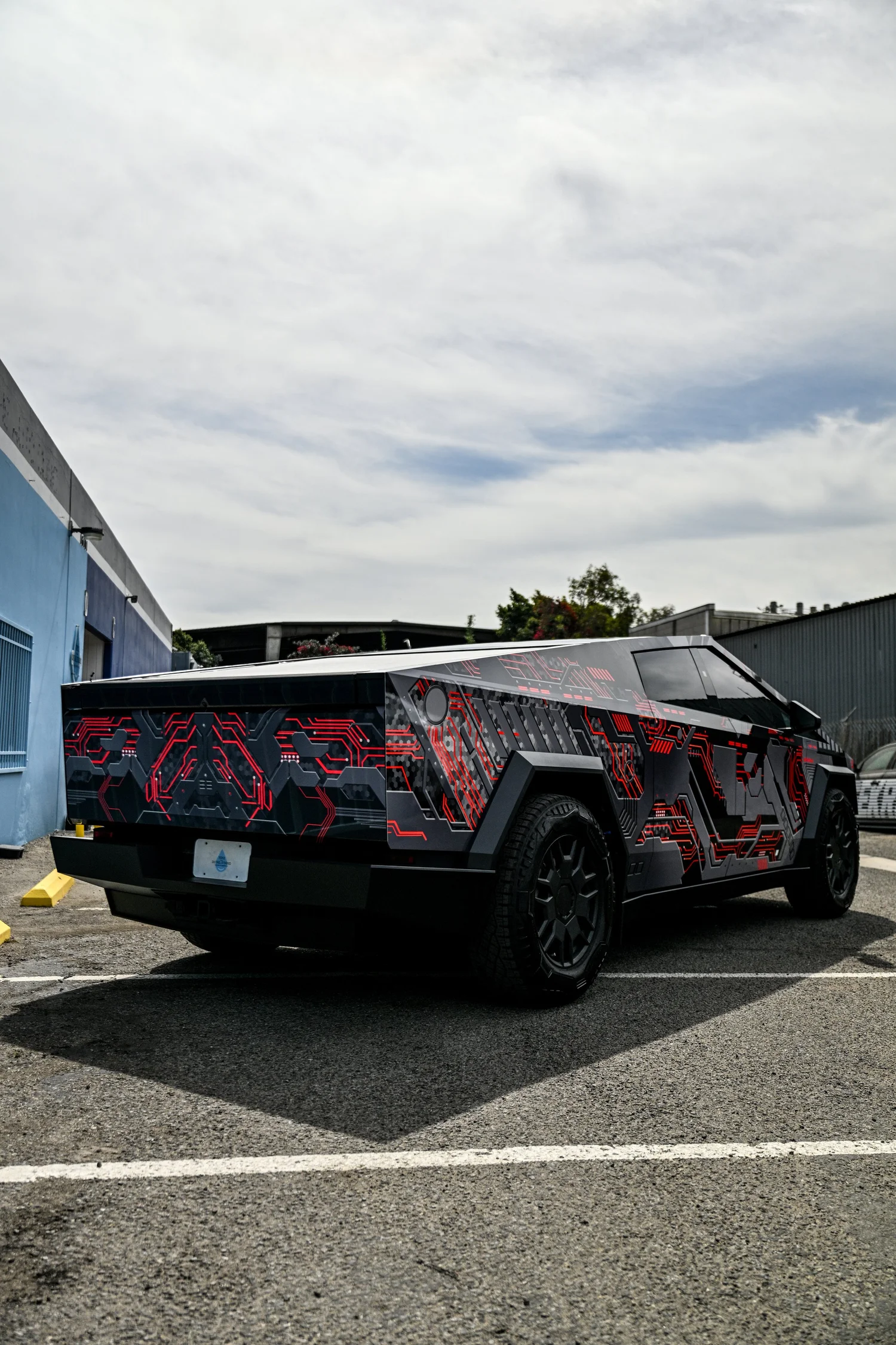 Rear three-quarter view of Tesla Cybertruck custom graphic wrap