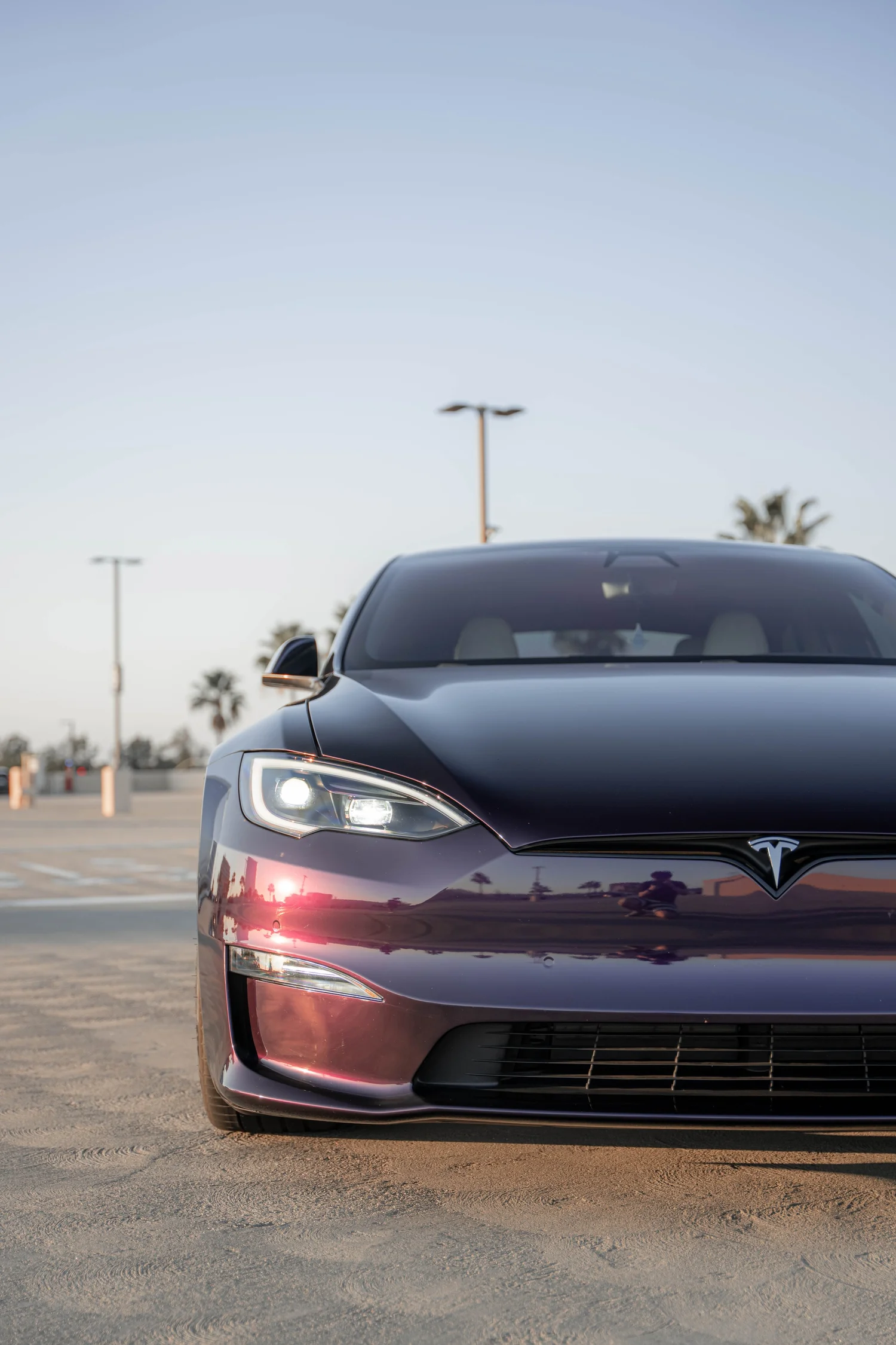 Tesla Model S Midnight Purple after Vinyl Wrap, front-corner view