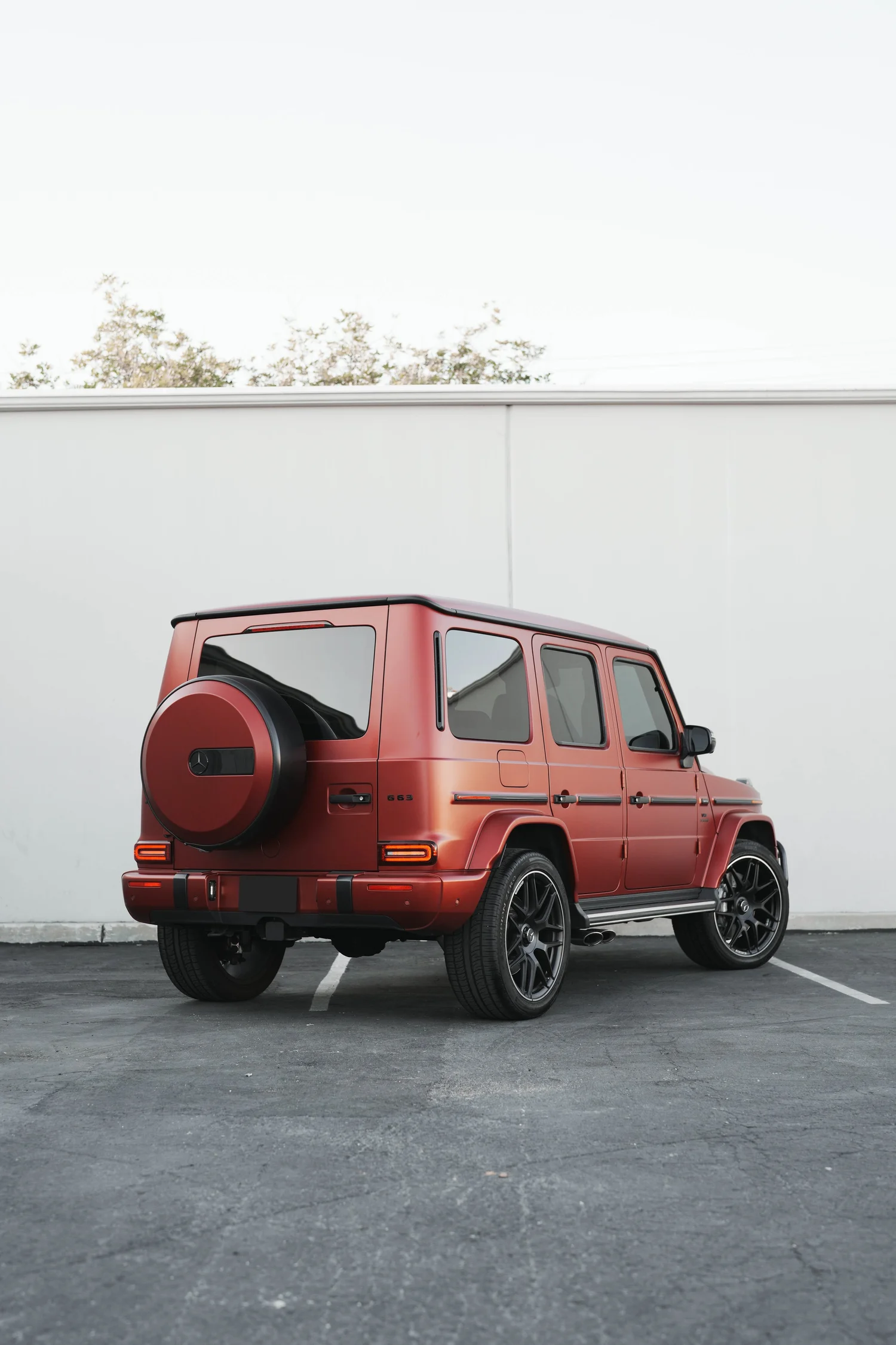 Red Mercedes-AMG G 63 after Matte PPF, Window Tint and Ceramic Coating, rear-right three-quarter view