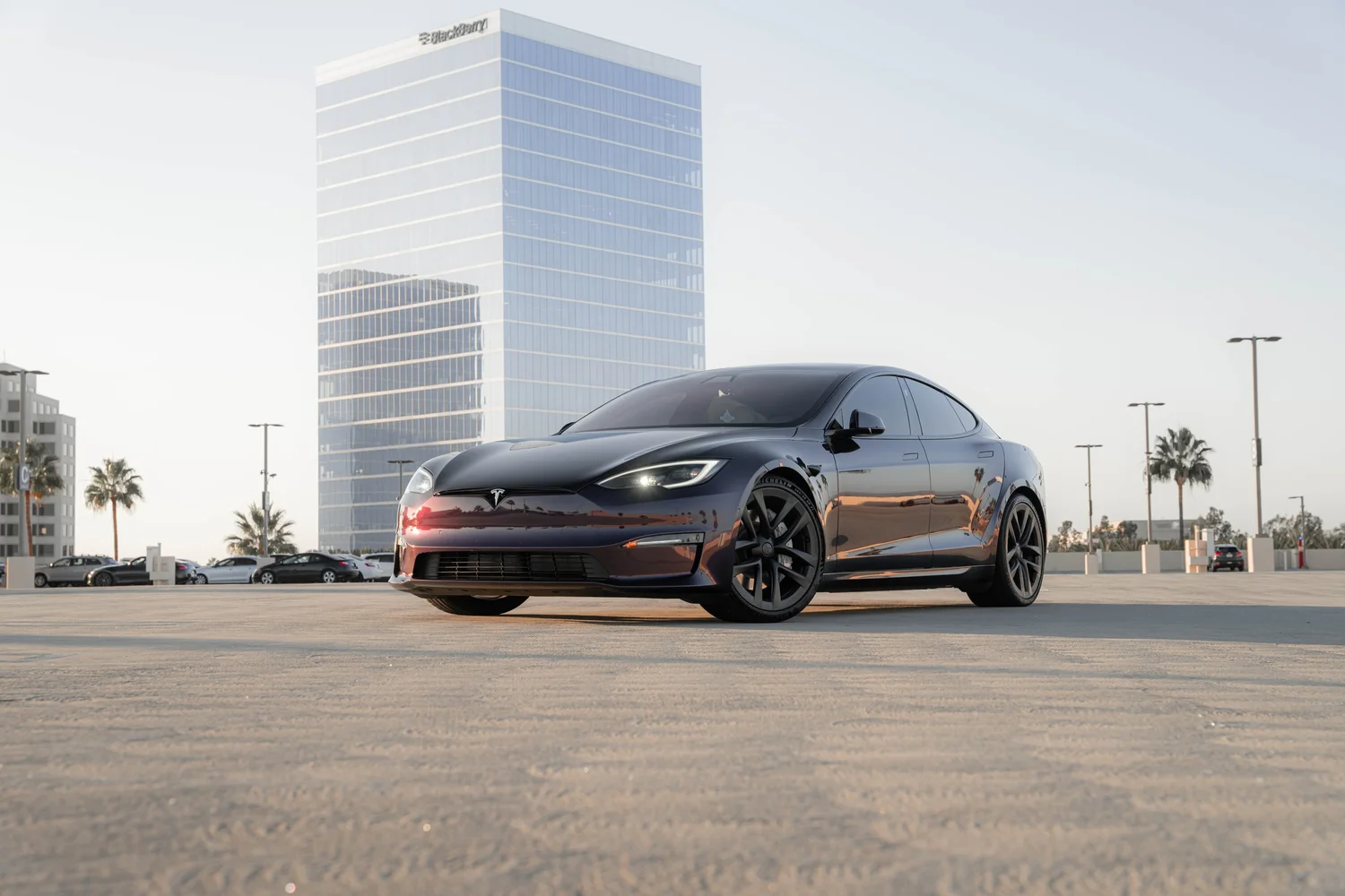 Tesla Model S Midnight Purple after Vinyl Wrap, wide outdoor view