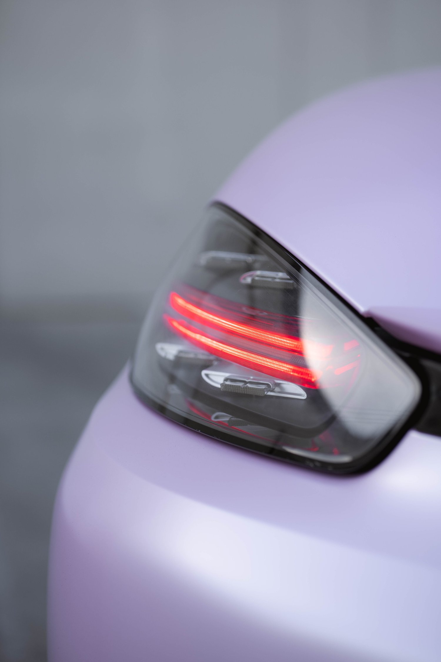 Porsche 718 Boxster Matte Purple Pink after Vinyl Wrap, rear bumper and taillight detail